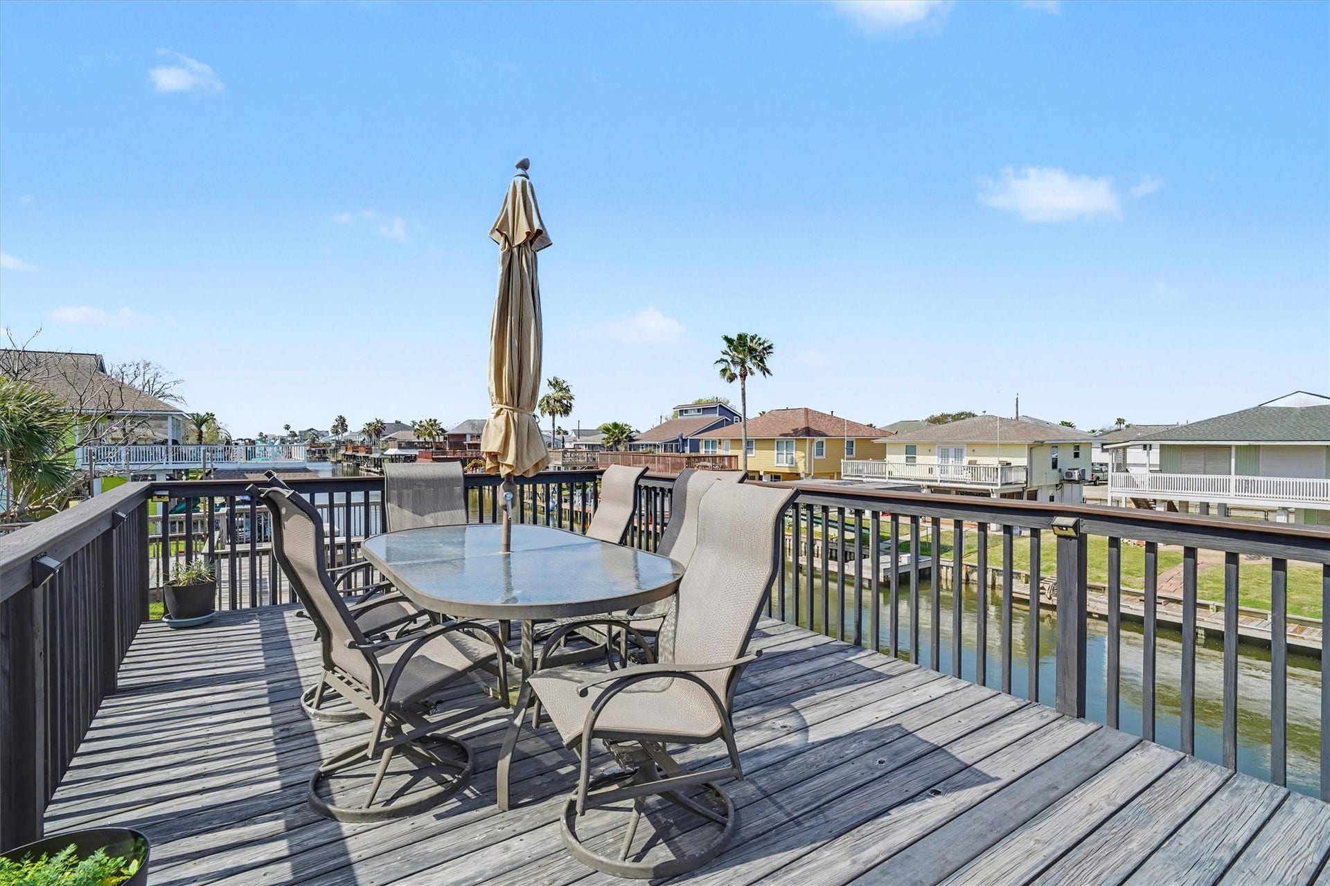 437 Pompano Street, Bayou Vista, TX 77563 Upper party deck designed for pure relaxation and coastal enjoyment. Picture unwinding after a long day, cold beverage in hand, as gentle breezes and waterfront views create the perfect end to any day. A true outdoor sanctuary for entertaining or simply soaking in the serenity