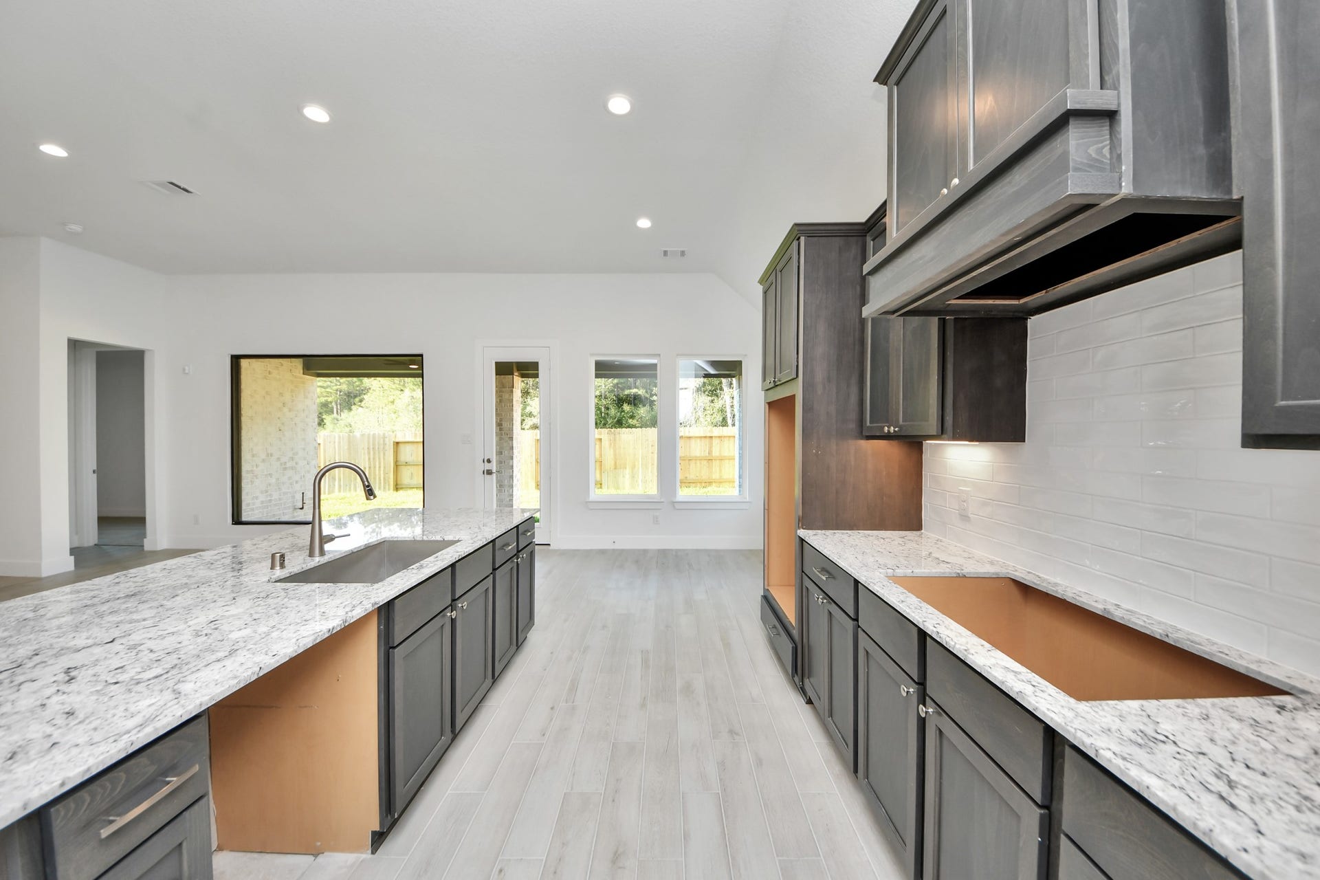 The extended counter area adds both practicality and style, making meal preparation a breeze. Every detail is thoughtfully designed to enhance the kitchen's functionality and aesthetic appeal.
