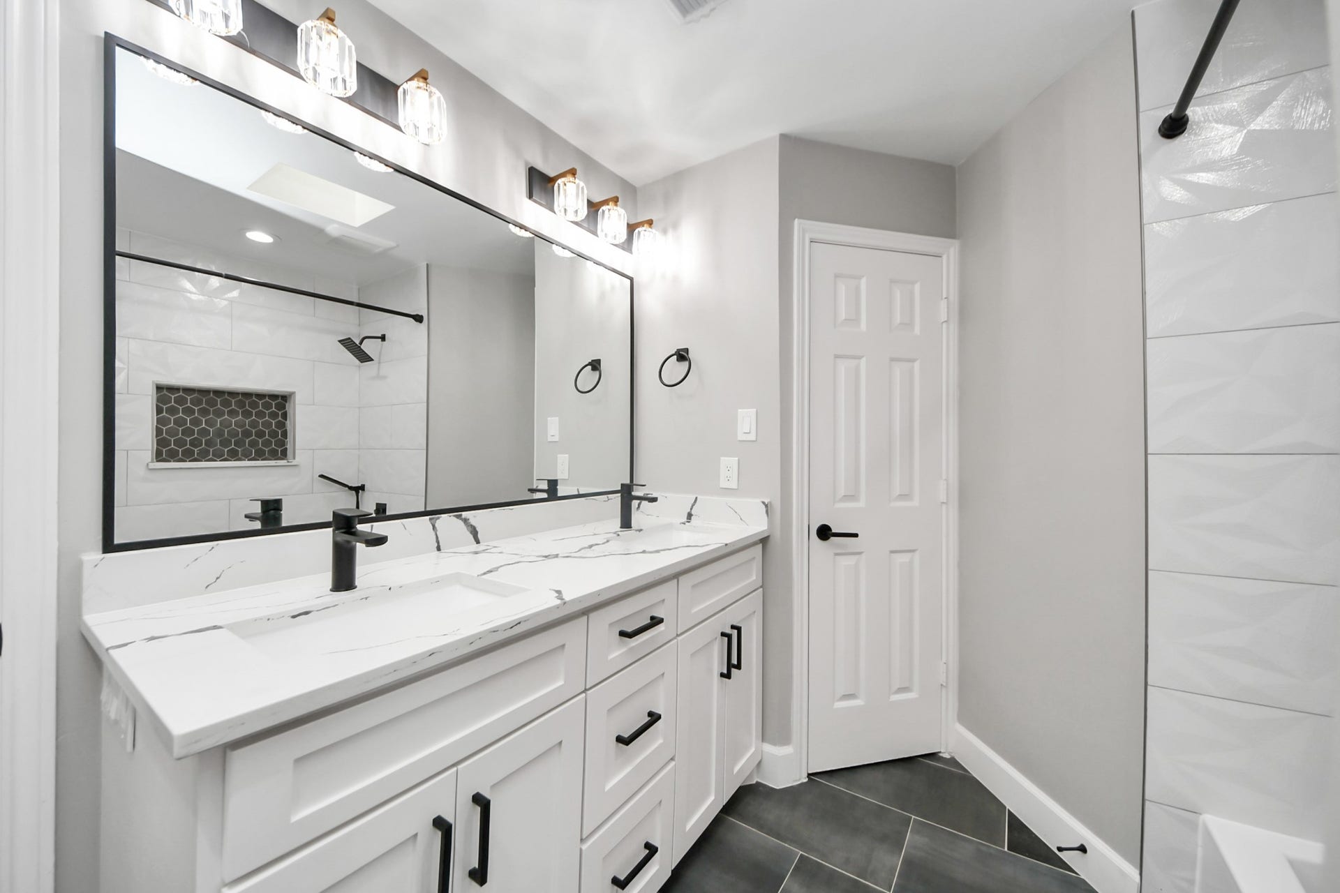24 Hornsilver Place, The Woodlands, TX 77381 Double-sink vanity for secondary bathroom upstairs.