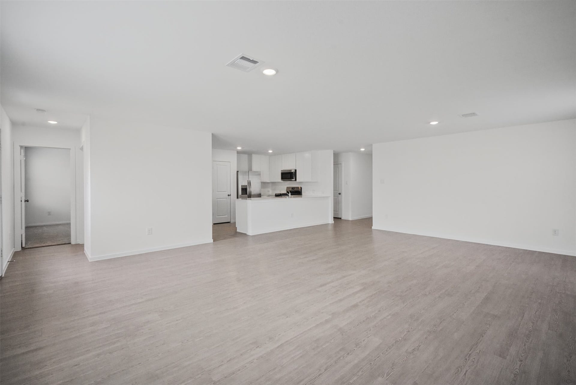 1718 Primrose Pointe Drive, Crosby, TX 77532 One spacious layout, endless possibilities. Create dedicated living and dining areas while still enjoying the easy flow and connection of an open-concept home.