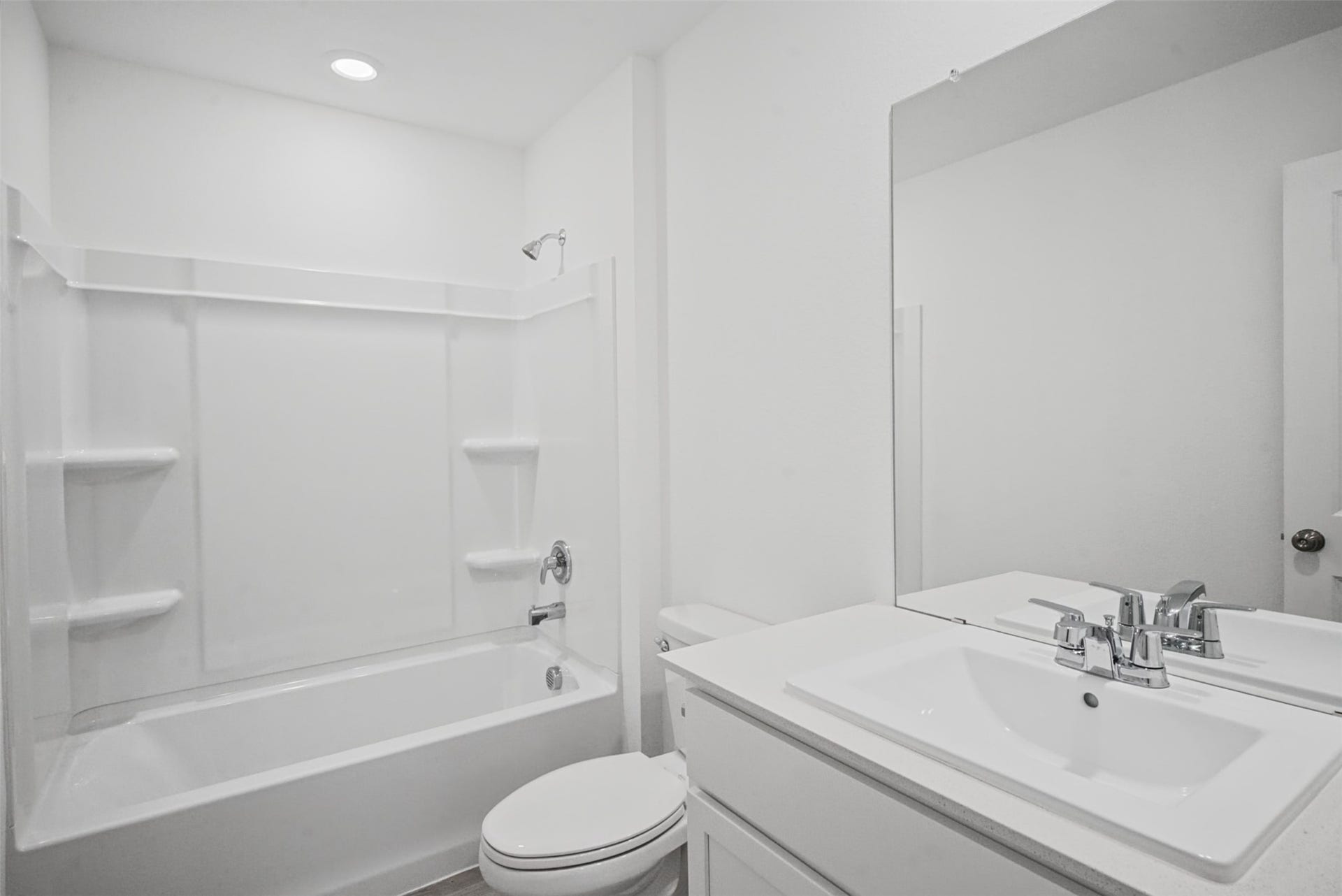 1718 Primrose Pointe Drive, Crosby, TX 77532 Designed for easy everyday routines, this fresh full bath combines a spacious vanity with a tub-and-shower setup for added versatility.