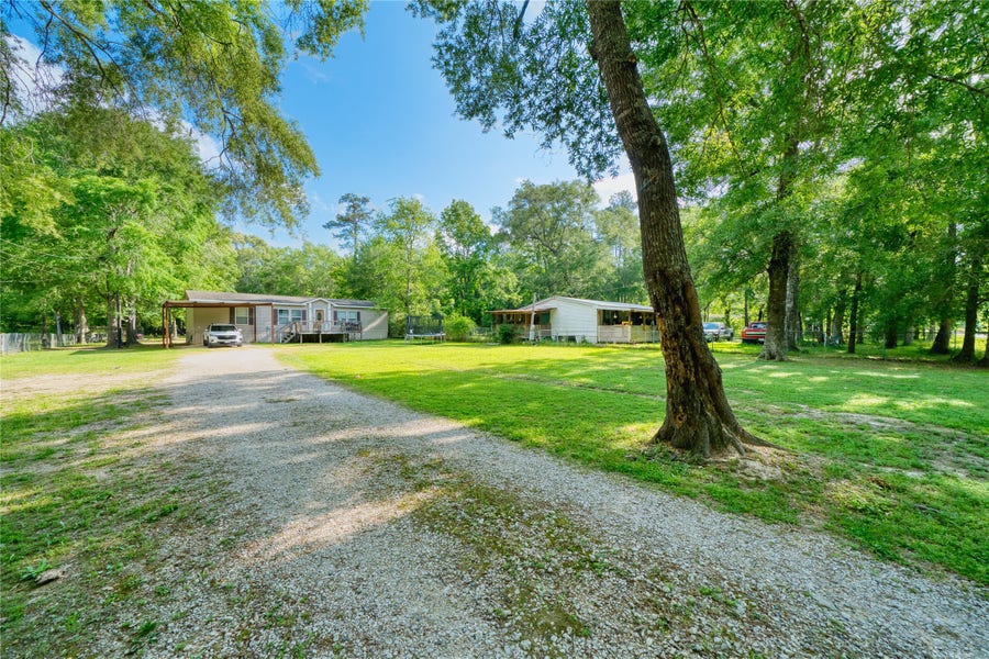 Property photo for 103 County Road 370, Splendora, TX