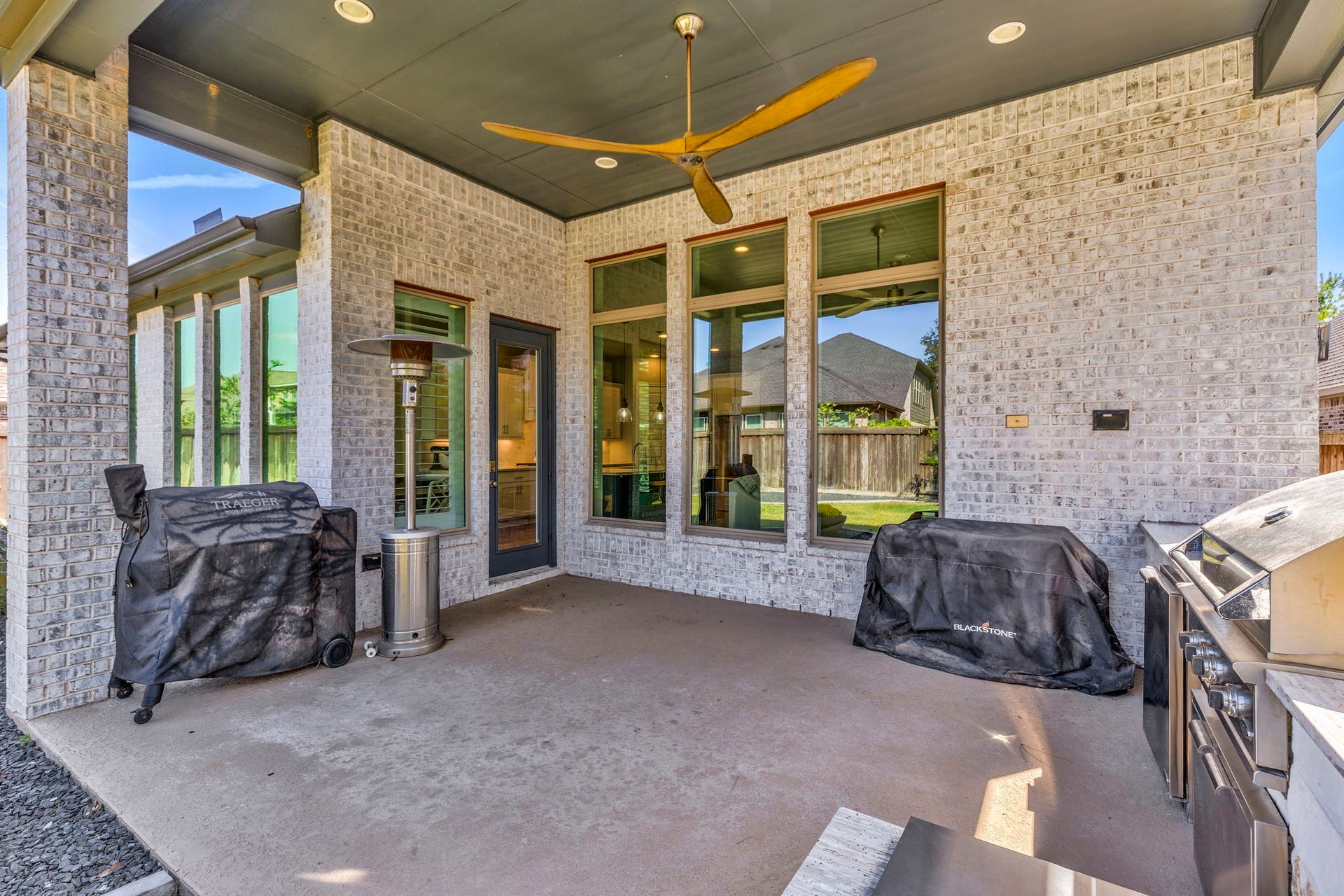 28309 Sterling Oak Drive, Spring, TX 77386 Large covered patio with custom fan