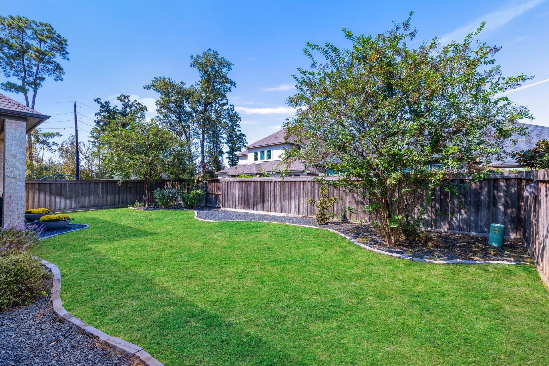 28309 Sterling Oak Drive, Spring, TX 77386 Backyard with landscaping