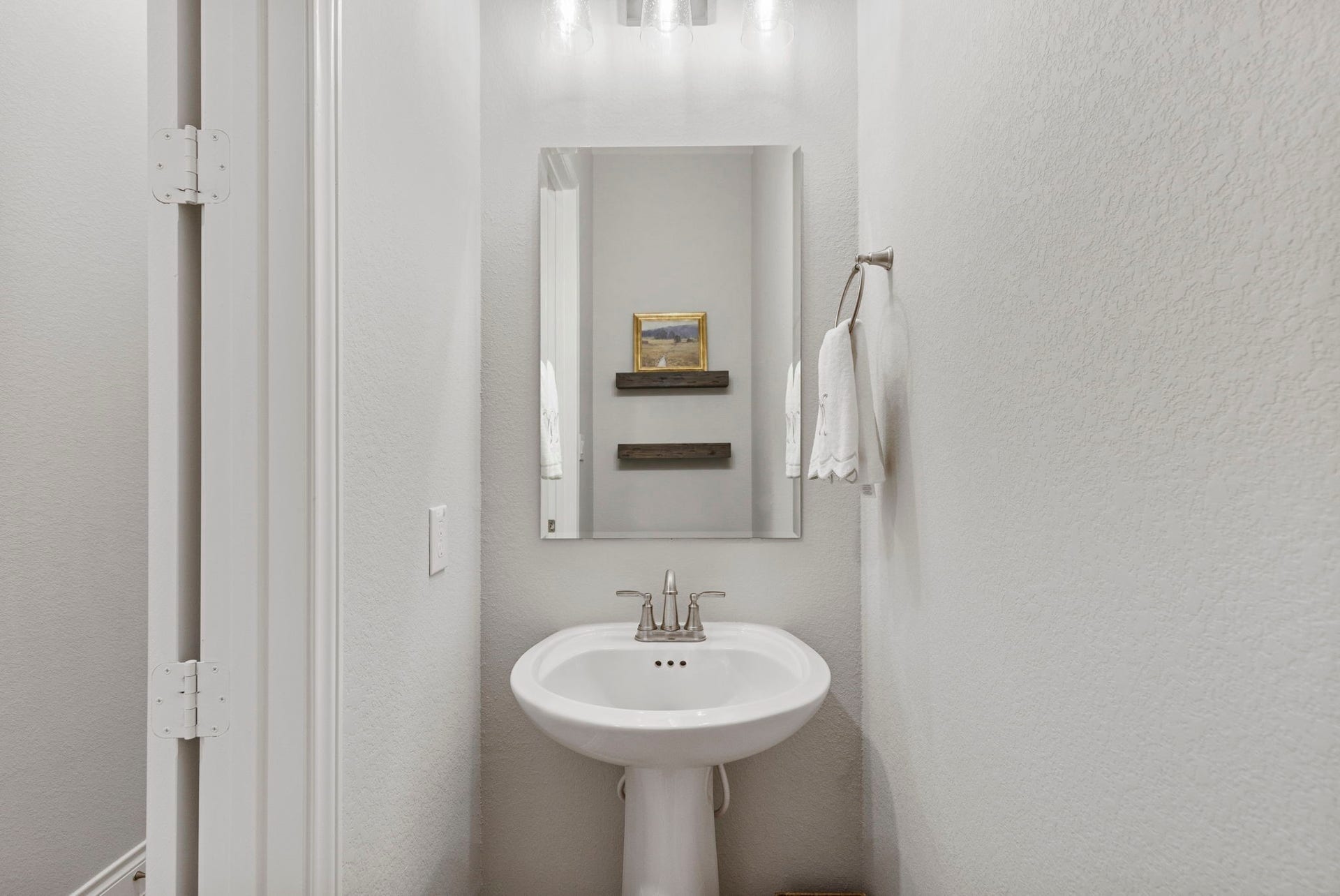 28309 Sterling Oak Drive, Spring, TX 77386 Powder bath located ithe n hallway off the garage entrance
