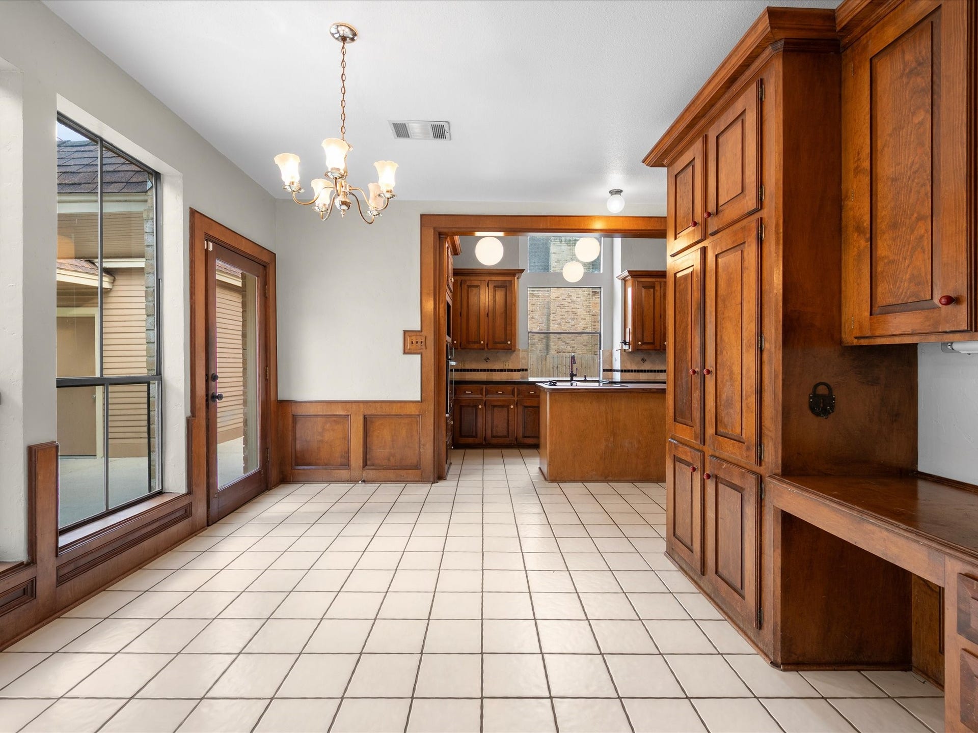 18006 Memorial Estates Drive, Spring, TX 77379 The breakfast nook has a built-in desk and cabinets and opens right into the kitchen.