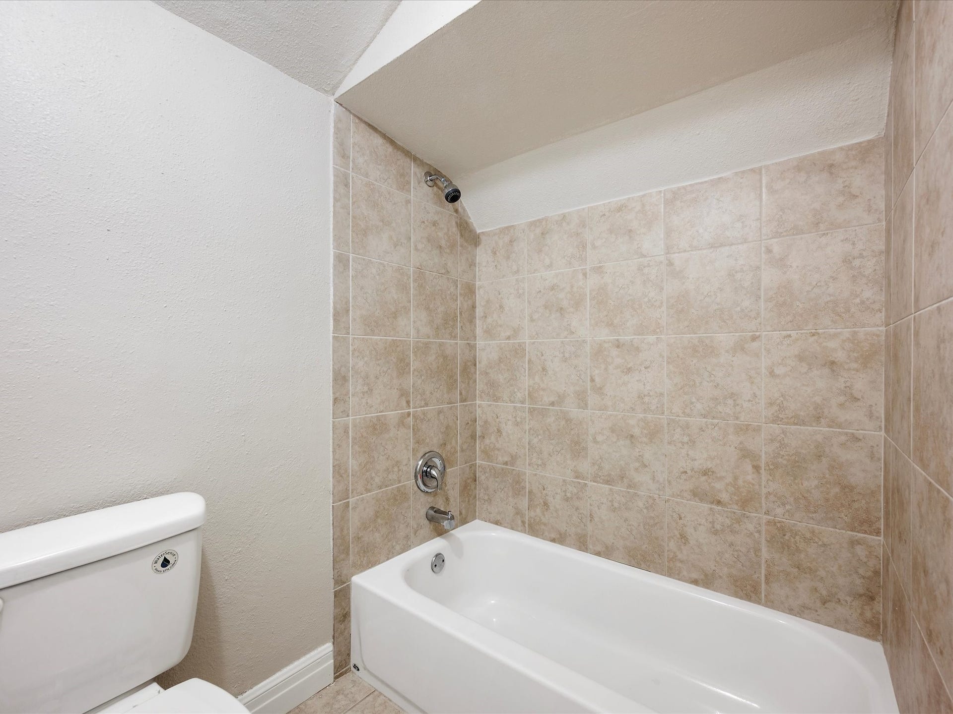 18006 Memorial Estates Drive, Spring, TX 77379 Tub and shower combo in the upstairs bath.