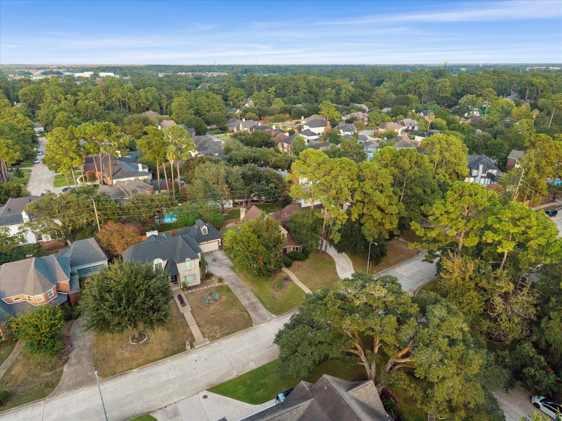 18006 Memorial Estates Drive, Spring, TX 77379 Aerial view of the street, with mature trees throughout Memorial Northwest Estates.