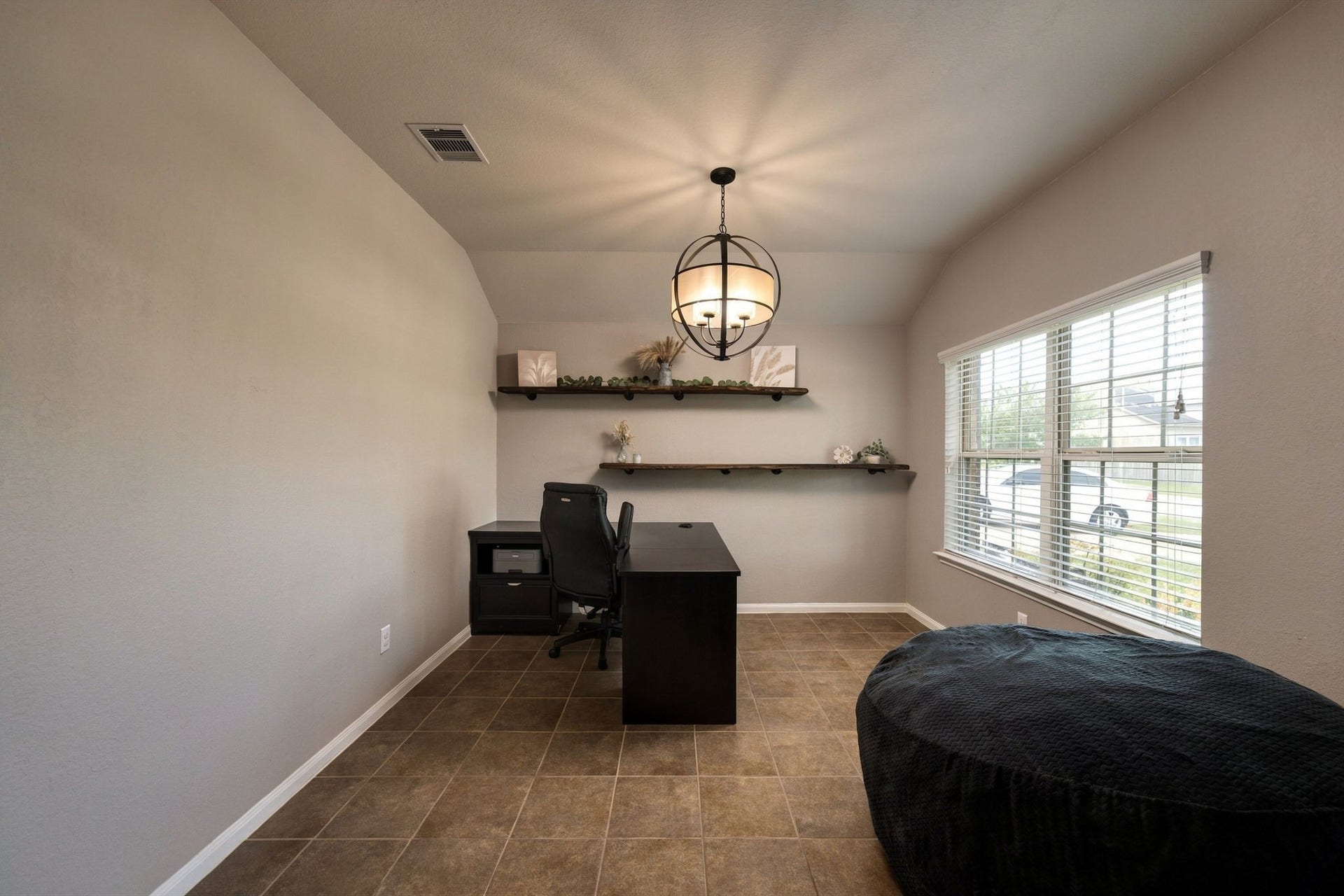 336 Country Crossing Circle, Magnolia, TX 77354 Spacious home office with a modern lighting, with large windows providing ample natural light.