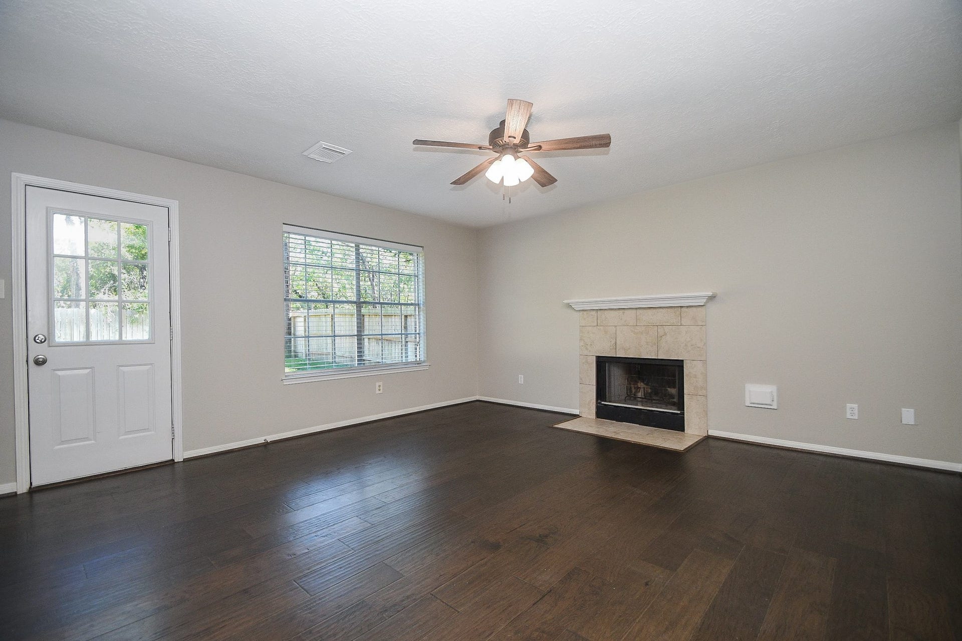 18622 Islandbreeze Drive, Spring, TX 77379 This large family room has a fireplace which is hard to find in new builds.