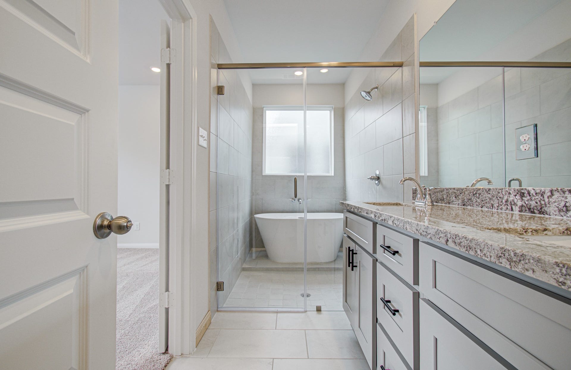 14210 Aston Pine Drive, Houston, TX 77032 Primary Bathroom is spa-like! Please Note this is a different home/floorplan in the community.