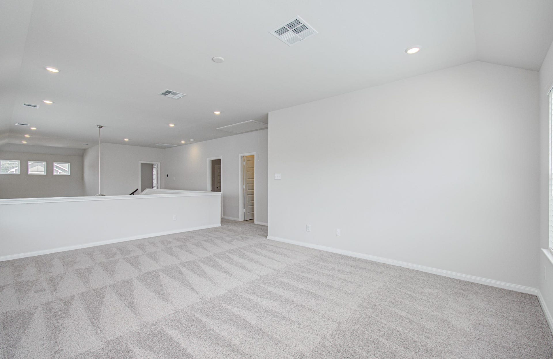 14210 Aston Pine Drive, Houston, TX 77032 Upstairs loft game-room area. Please Note this is a different home/floorplan in the community.