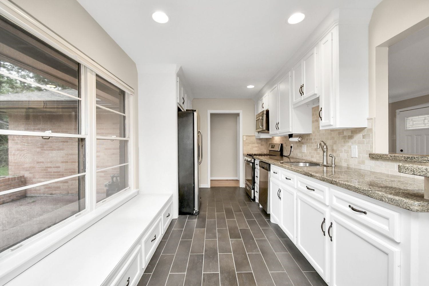 2314 Lamonte Lane, Houston, TX 77018 Gallery style kitchen