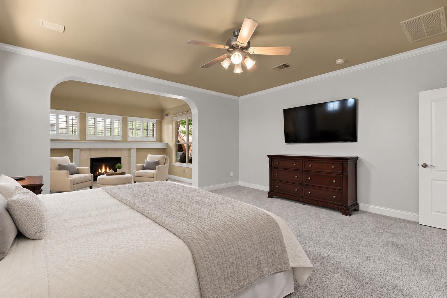 11 Saint Thomas Court, Houston, TX 77070 Escape to this inviting first-floor primary suite, featuring a ceiling fan, generous room dimensions and an adjoining sitting area with its own fireplace for added comfort.**Virtually Staged**