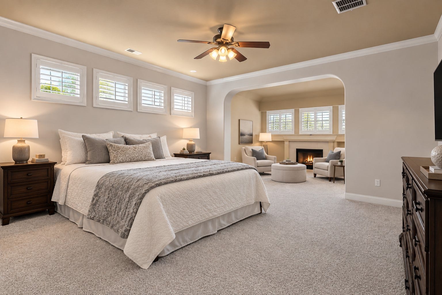 11 Saint Thomas Court, Houston, TX 77070 A BEAUTIFUL FIRST-FLOOR RETREAT! This generously sized primary bedroom features a raised ceiling, soft neutral finishes and a spacious layout designed for comfort and relaxation. **Digitally Staged**