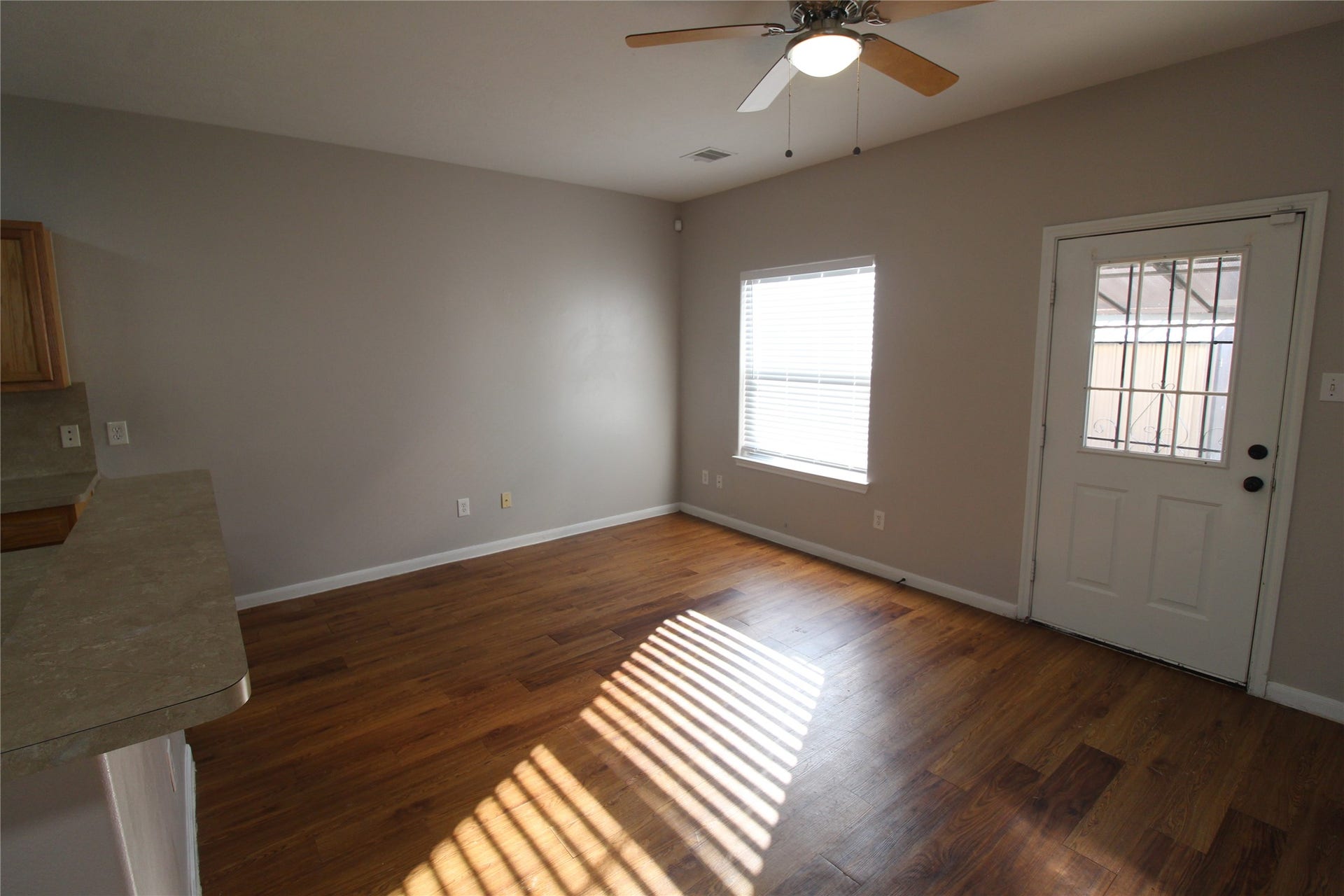 7816 Comal Street, #B, Houston, TX 77051 Family room is open to the kitchen and has immediate access the the covered patio area.