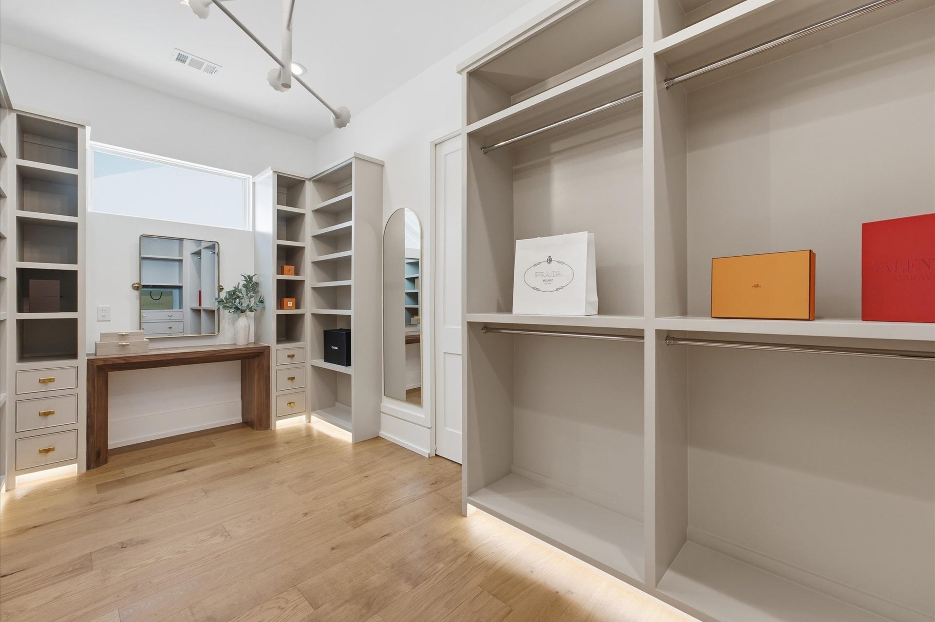 4313 Lula Street, Bellaire, TX 77401 Spacious built-in closet with abundant shelving, drawers, and organized storage.