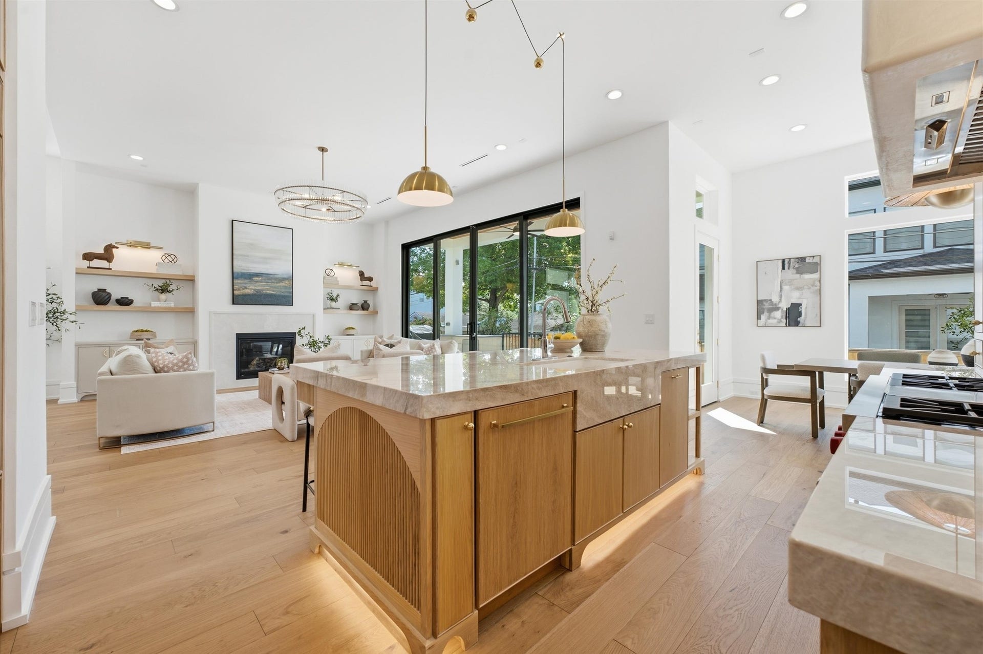 4313 Lula Street, Bellaire, TX 77401 Open kitchen showcasing a large island, modern finishes, and seamless living-space connection.
