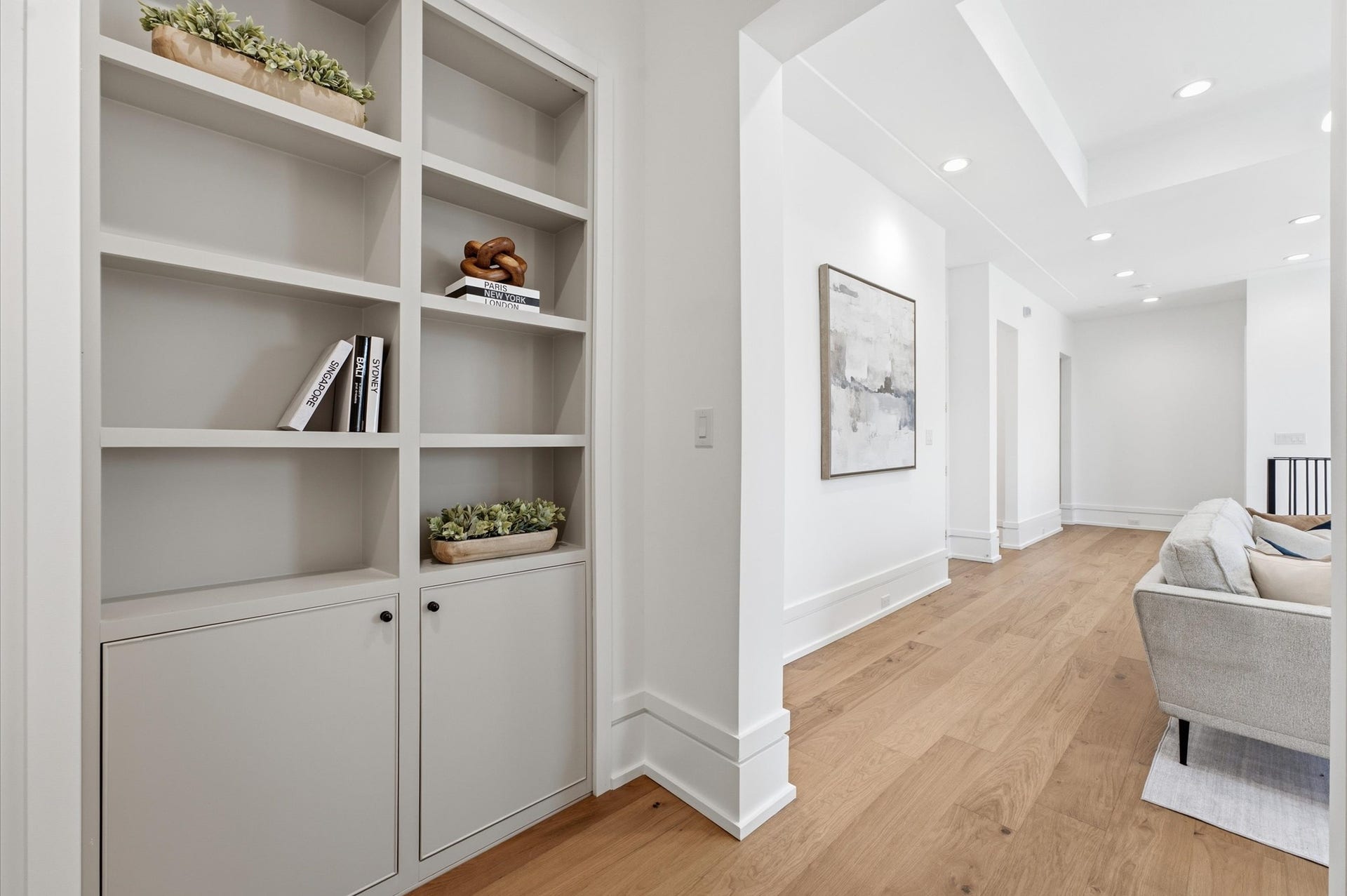 4313 Lula Street, Bellaire, TX 77401 Built-in shelving with ample storage overlooking a bright hallway.