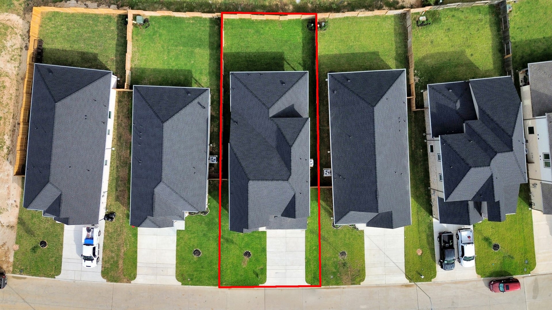 24514 Broad Park Ct, Spring, TX 77373 An aerial view of a spacious subdivision lot, highlighting a well-maintained yard and a fully fenced perimeter, offering both privacy and expansive outdoor space.