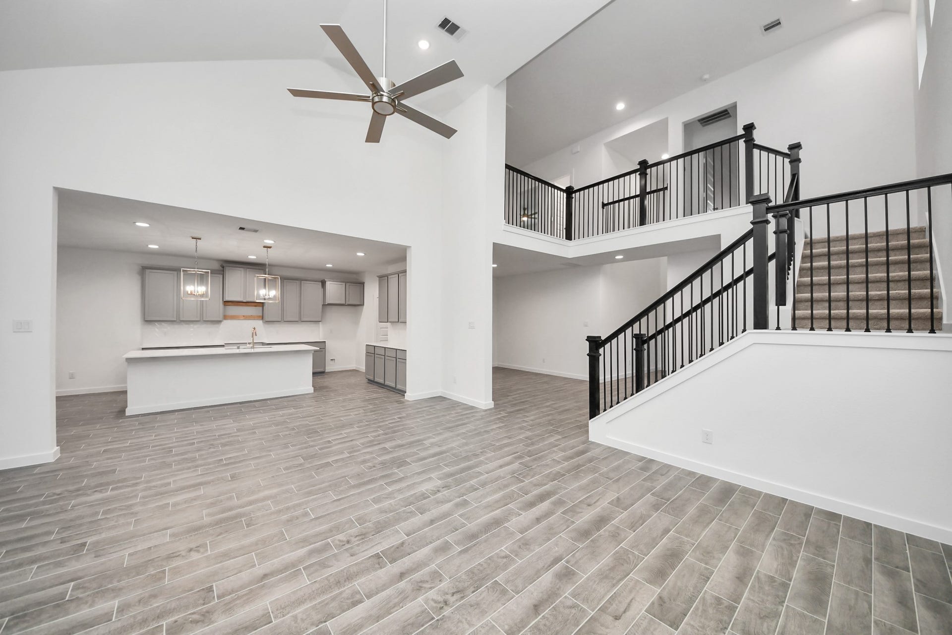 24514 Broad Park Ct, Spring, TX 77373 Gather the family and guests together in your lovely living room! Featuring soaring high ceilings, recessed lighting, ceiling fan, custom paint, gorgeous floors, and large windows that provide plenty of natural lighting throughout the day.