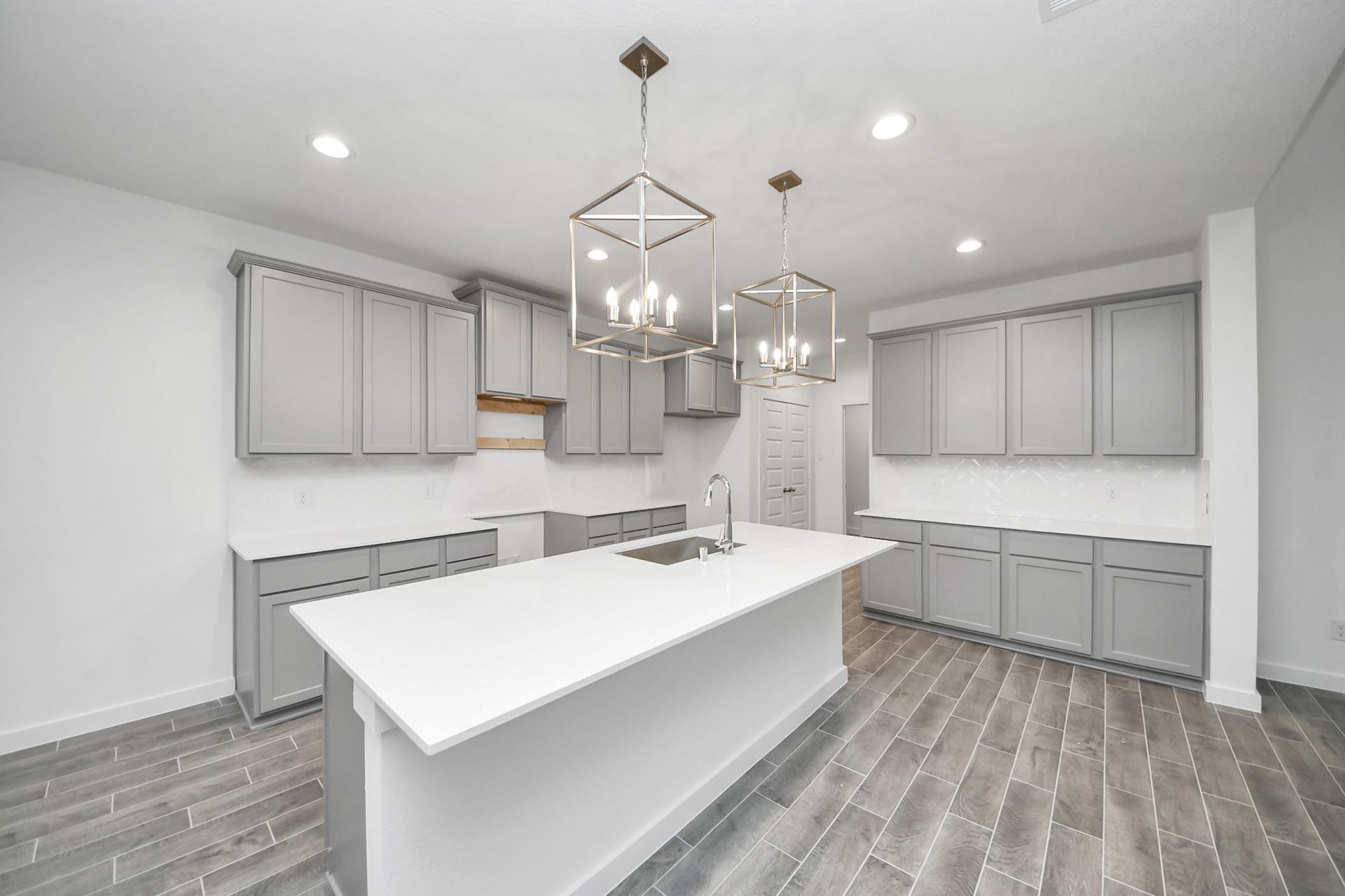 24514 Broad Park Ct, Spring, TX 77373 All of this overlooks your expansive family room, creating a perfect space for culinary delights and family gatherings.