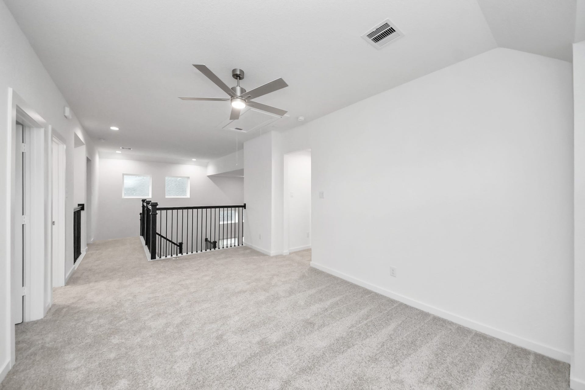 24514 Broad Park Ct, Spring, TX 77373 Come upstairs and enjoy a day of leisure in this fabulous game room! This is the perfect hangout spot or adult game room! Features plush carpet, high ceilings, custom paint and windows for plenty of natural light.