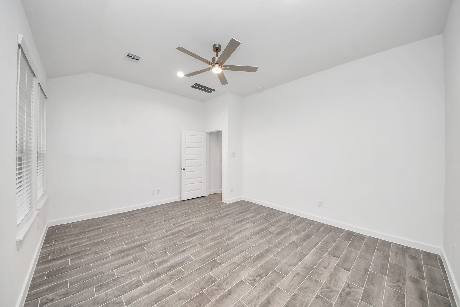 24514 Broad Park Ct, Spring, TX 77373 Escape and relax in the exquisite primary suite, a haven to unwind after a long day.