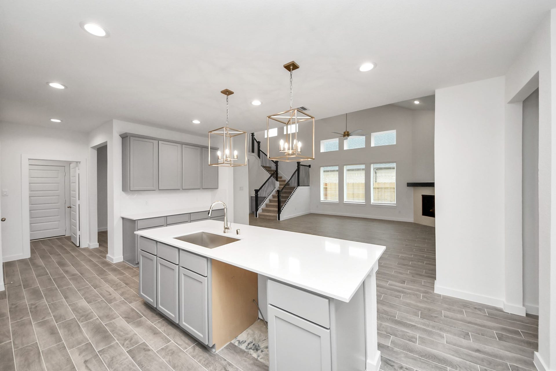 24514 Broad Park Ct, Spring, TX 77373 The open concept effortlessly connects the kitchen to the expansive family room, forming a perfect hub for gatherings. This seamless flow creates an inviting space where cooking and socializing come together harmoniously.