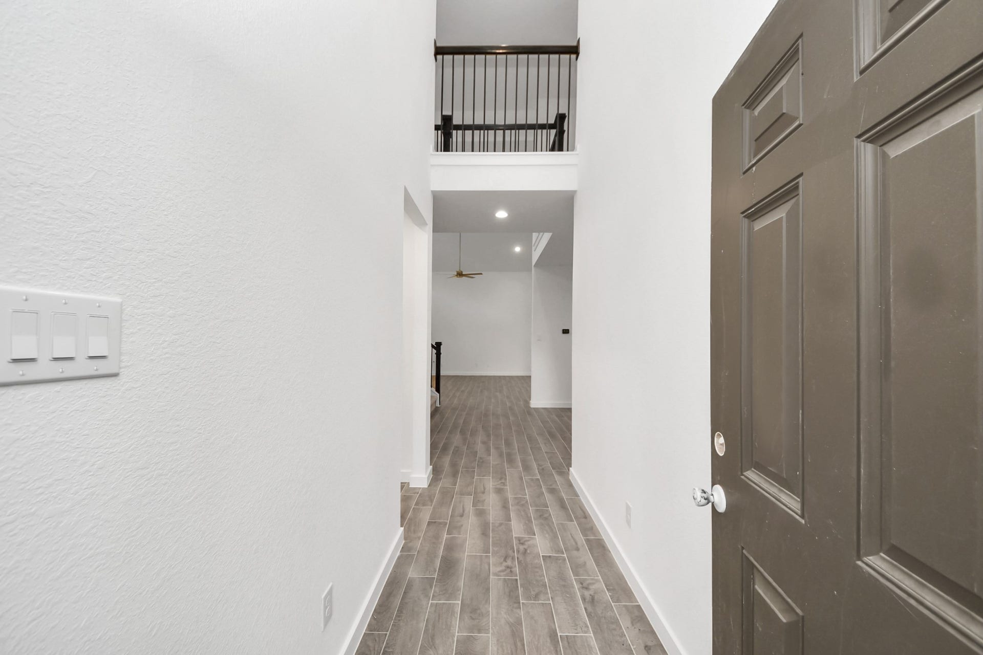 24514 Broad Park Ct, Spring, TX 77373 As you step into the threshold of this luxurious home, you'll soon be welcomed by an elegant glass door (to be installed). Inside, soaring ceilings amplify the spaciousness, while the refined wood-look tile flooring and oversized baseboards exude sophistication and charm.