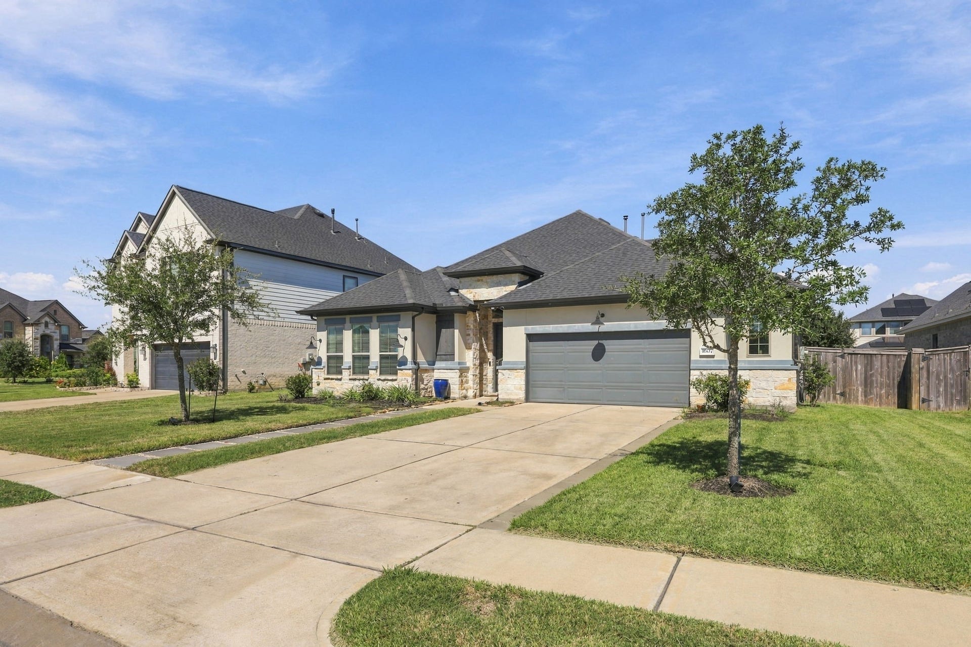 This beautiful single-story, four bedroom home offers inviting curb appeal and a thoughtfully designed layout.