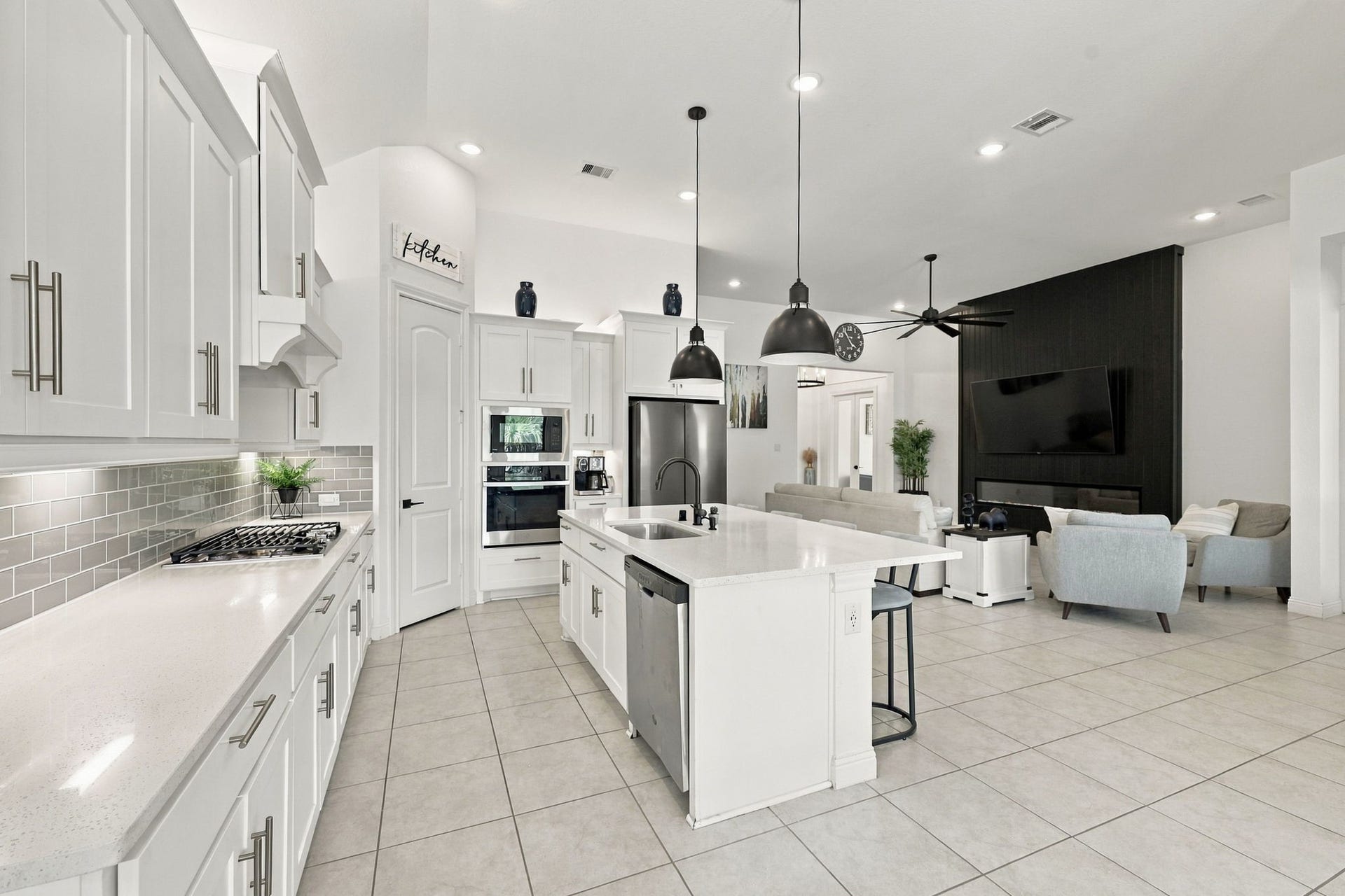 The kitchen opens directly to the living area, making it easy to stay connected while cooking or entertaining.