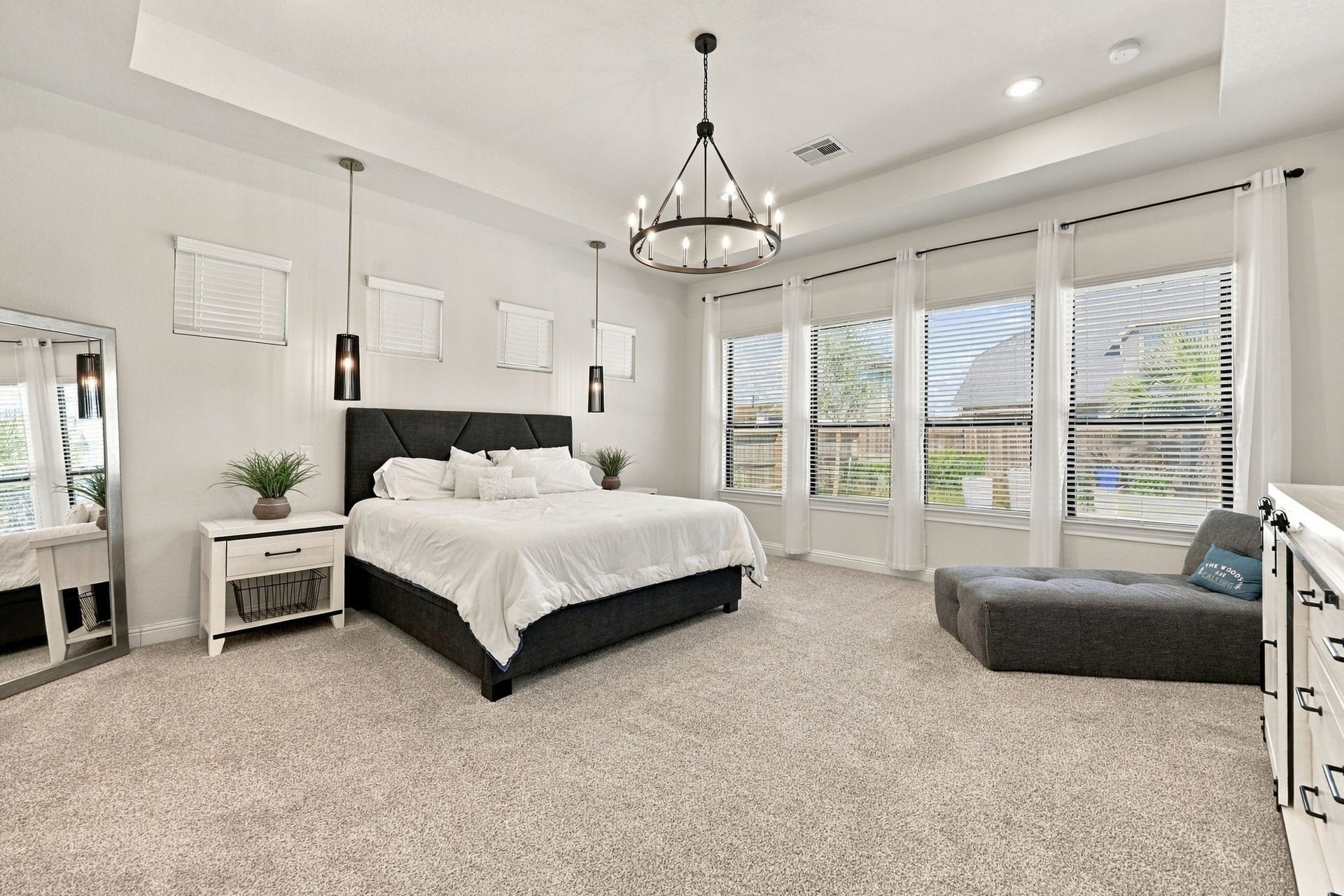 Now, let's explore the primary suite, a spacious retreat filled with natural light and designed for relaxation.