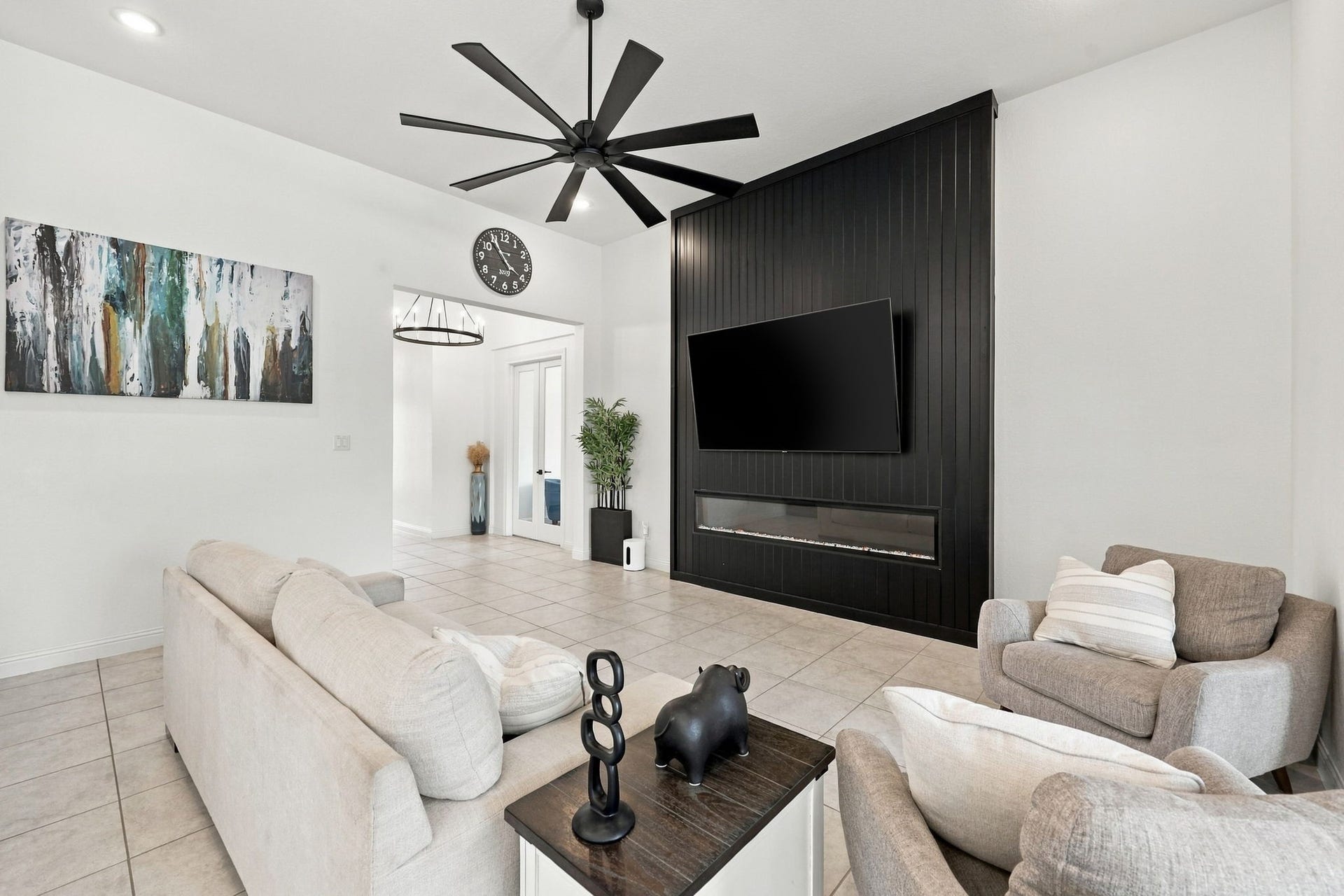 From this angle, appreciate the generous living space and thoughtfully designed layout that brings everyone together.