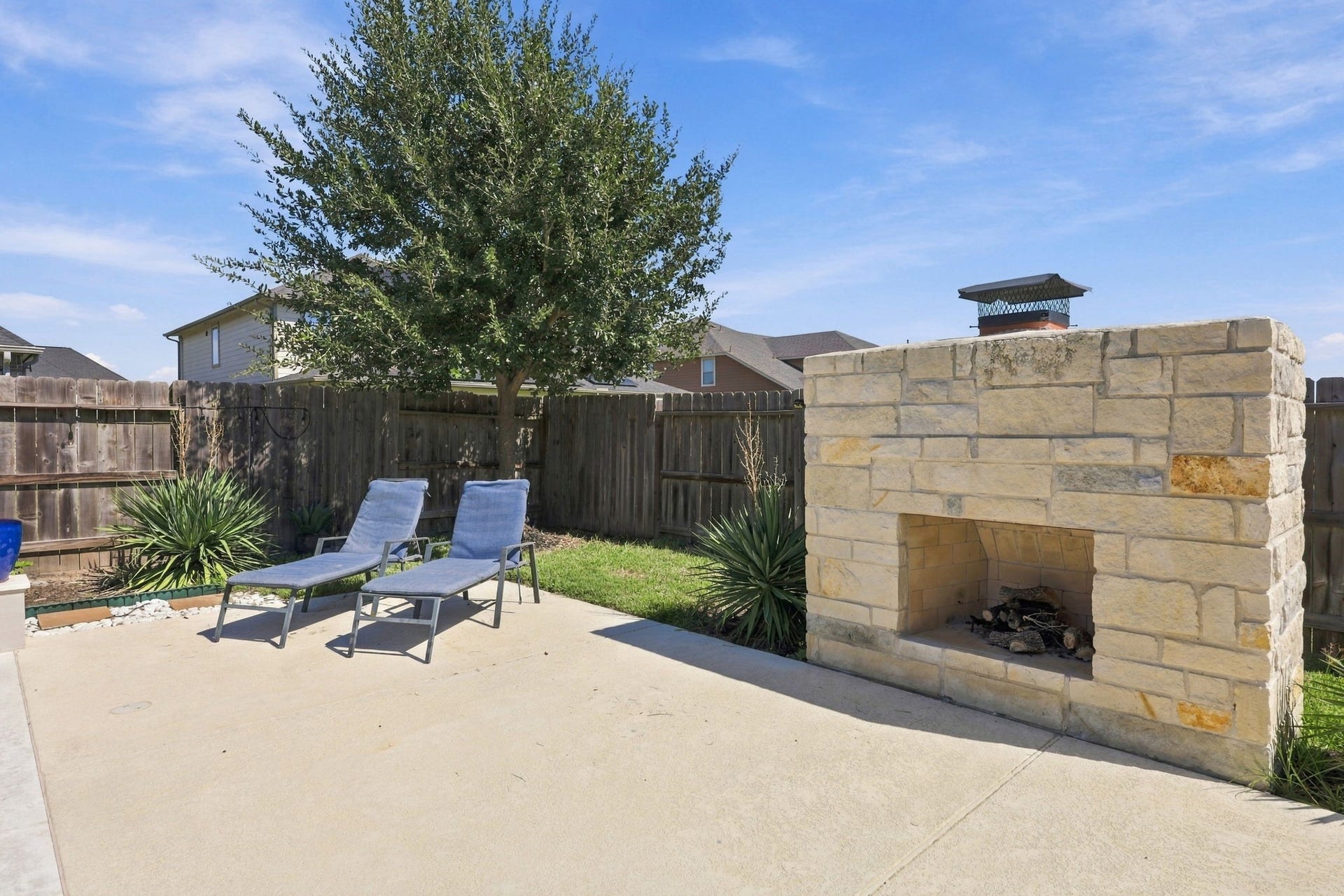 As the evening approaches, gather round the impressive outdoor fireplace, another beautiful addition to this home.