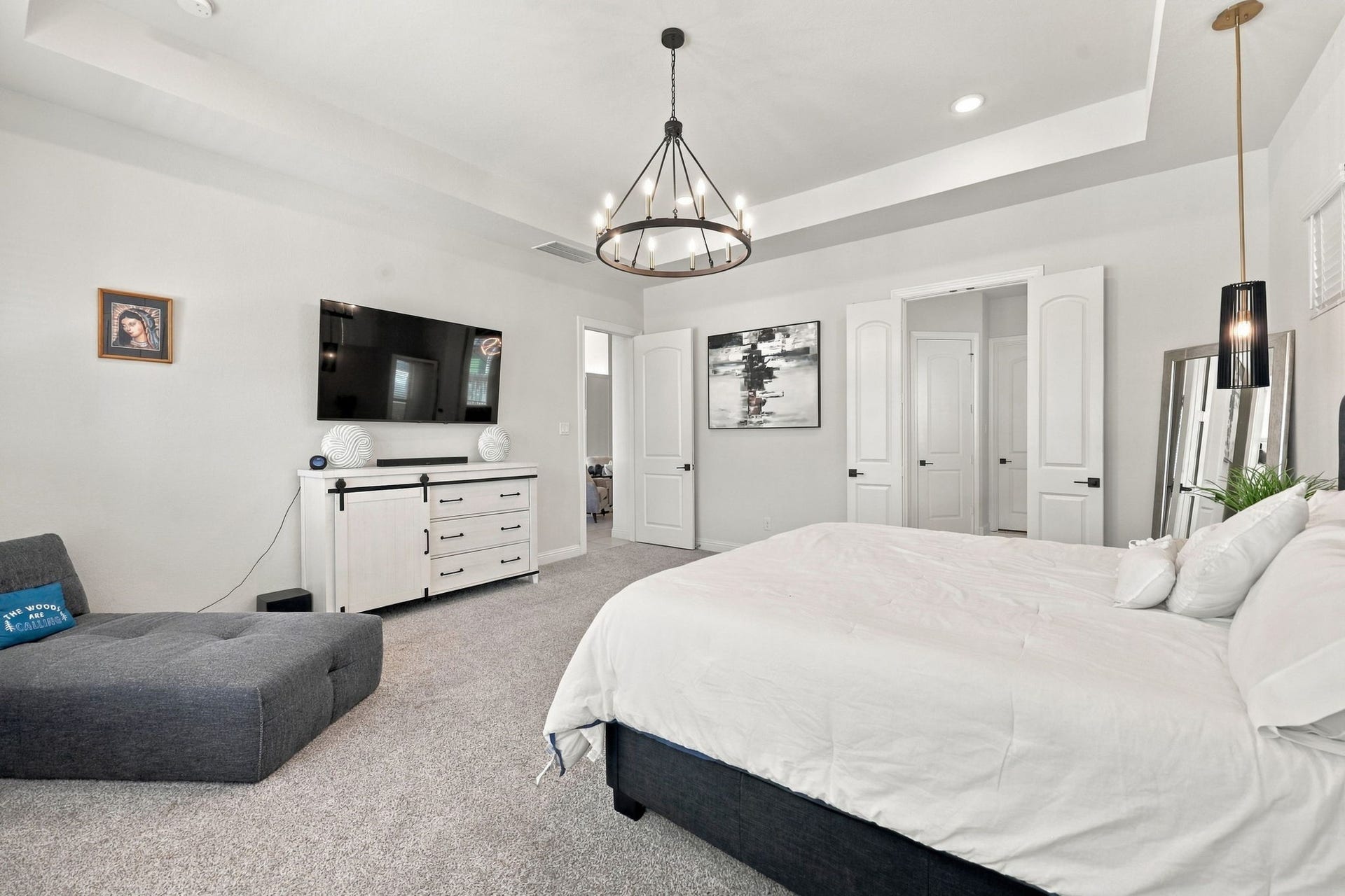 The primary bedroom offers generous space for your furnishings and a comfortable place to unwind after a long day.