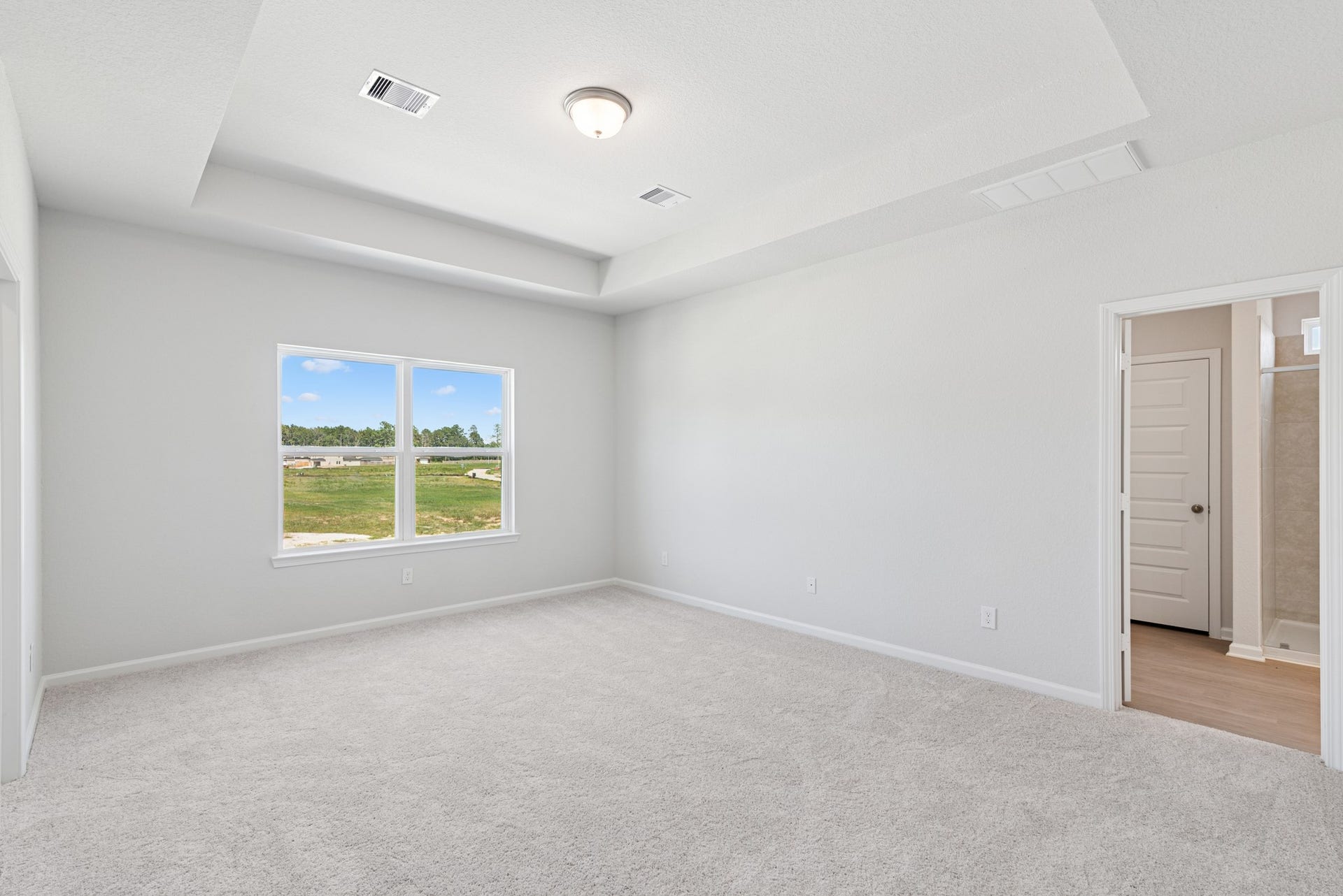 19130 Malatya Court, Montgomery, TX 77316 The Oriole II- Primary Bedroom with Tray Ceiling. Sample image to be used for example only, colors, options and upgrades vary.