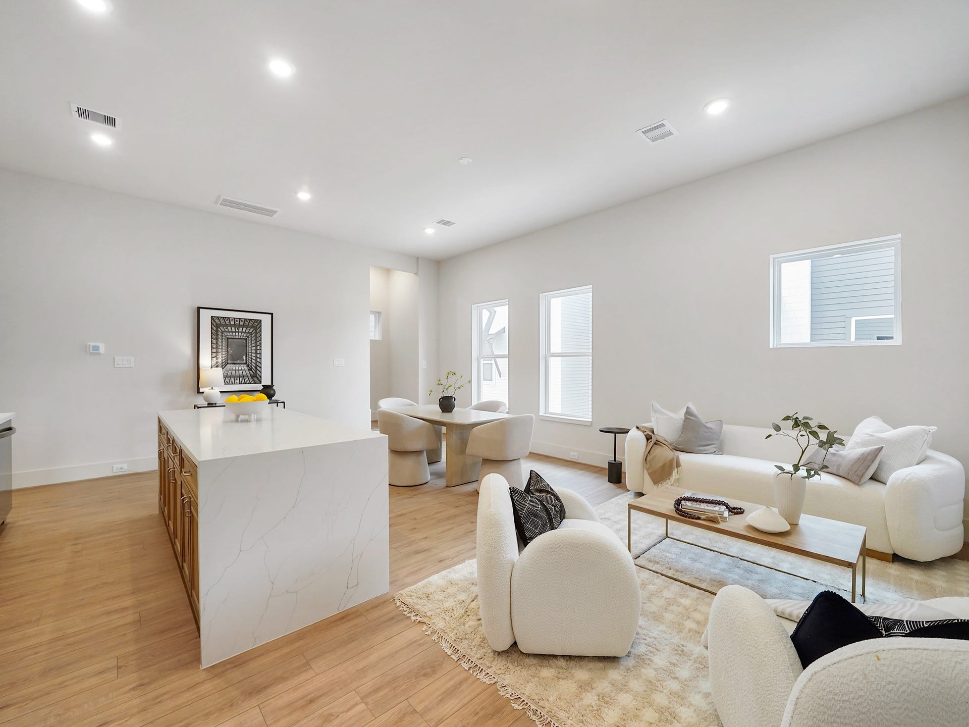 Experience the perfect blend of style and functionality with this open-concept space, offering plenty of counter space and bathed in abundant natural light.