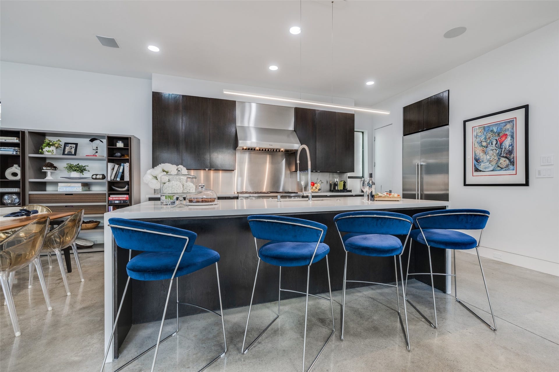 2014 Park Street, Houston, TX 77019 Huge Breakfast Island with counter height seating niche, white quartz countertops, waterfall edge, lights controlled by app through out main areas of the home.