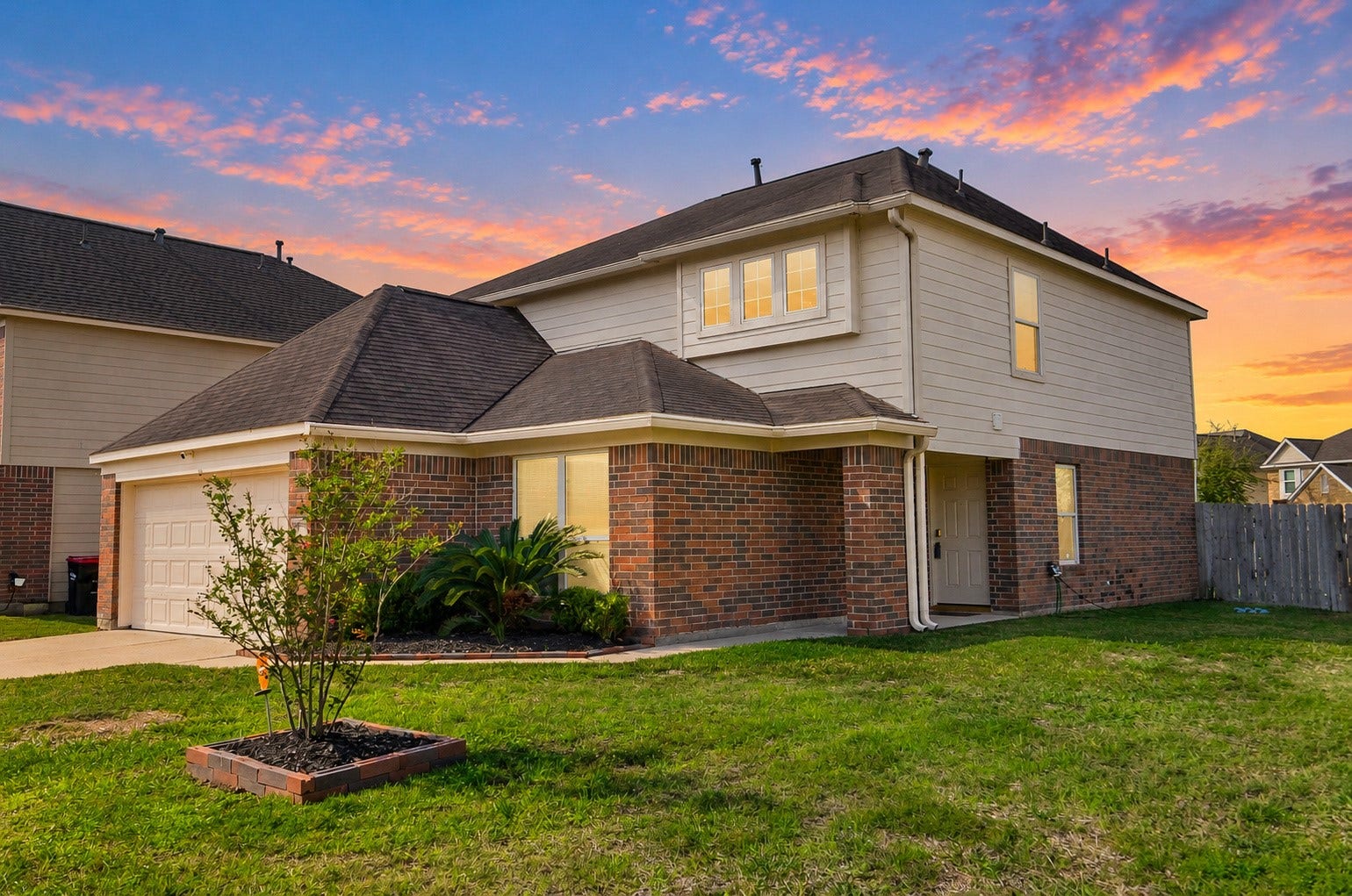 5031 Grove Square Court, Katy, TX 77449 Additional exterior view highlighting the home's two-story design, landscaping and generous corner lot.