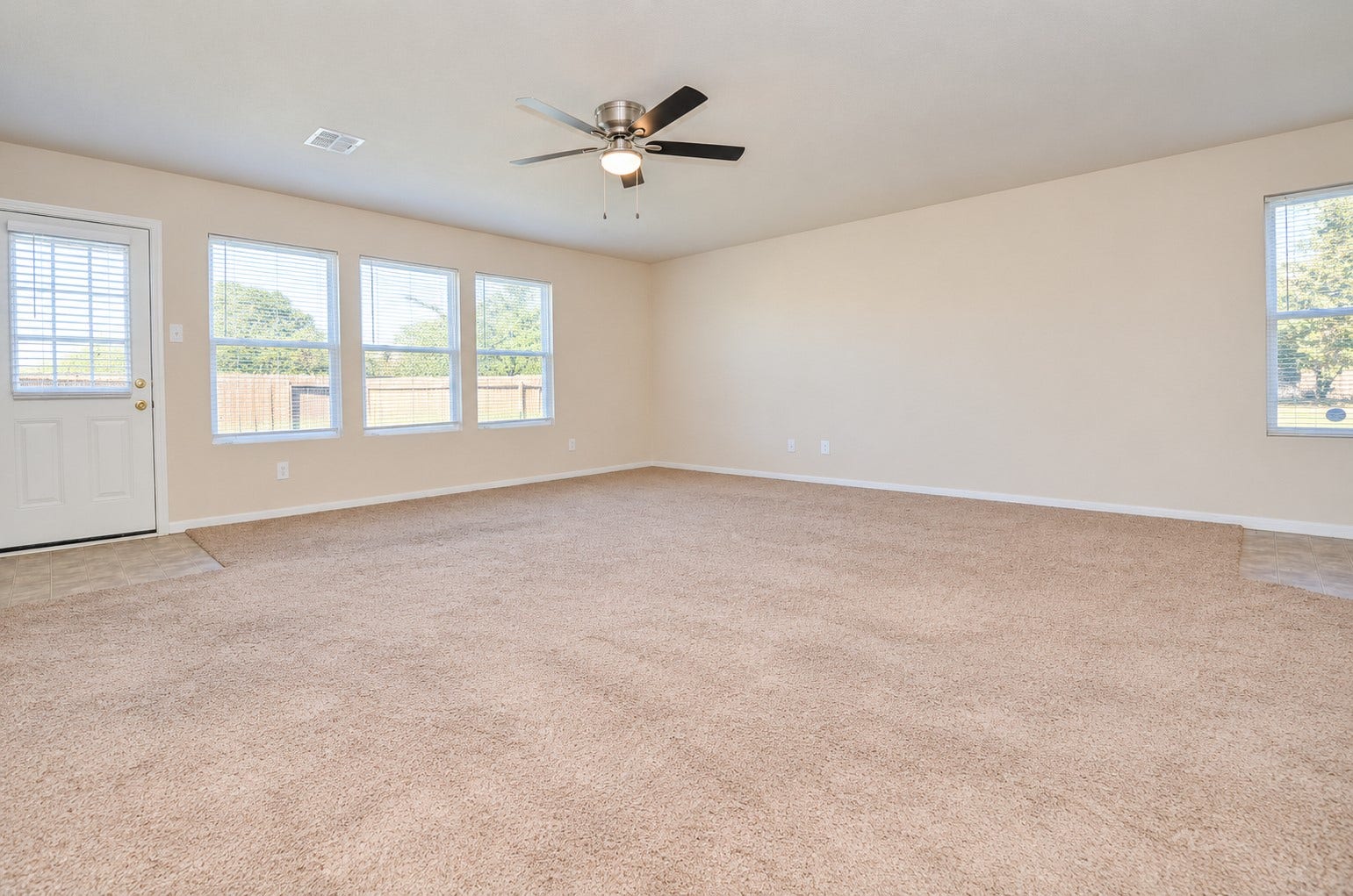 5031 Grove Square Court, Katy, TX 77449 Additional family room view highlighting the open layout, generous floor space and natural light.