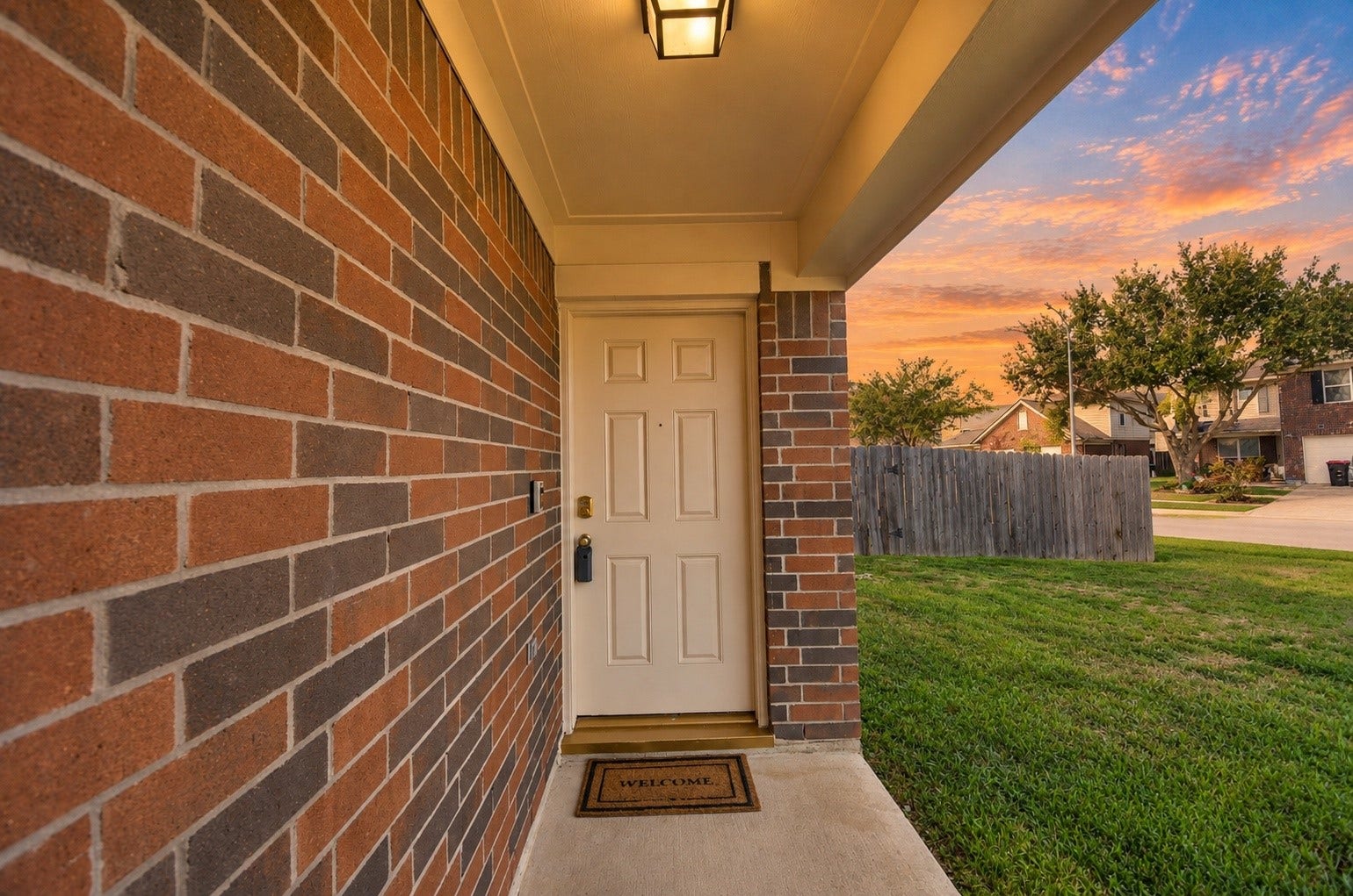 5031 Grove Square Court, Katy, TX 77449 Covered front entry with brick accents and a welcoming approach to the home.