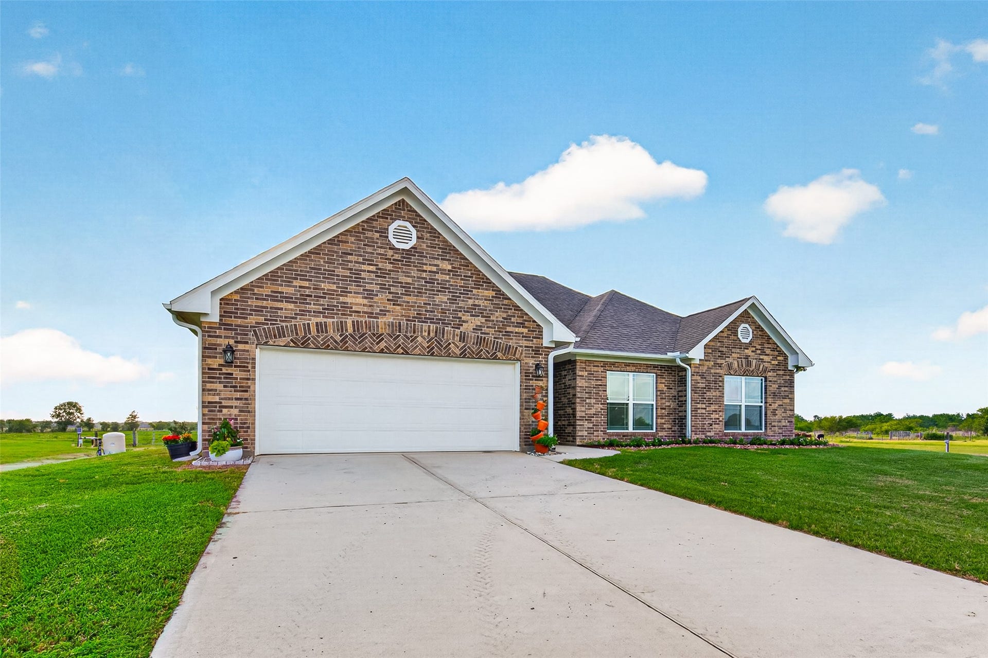 Concrete and extended gravel driveway space provides flexible parking and enough space for you and your guests