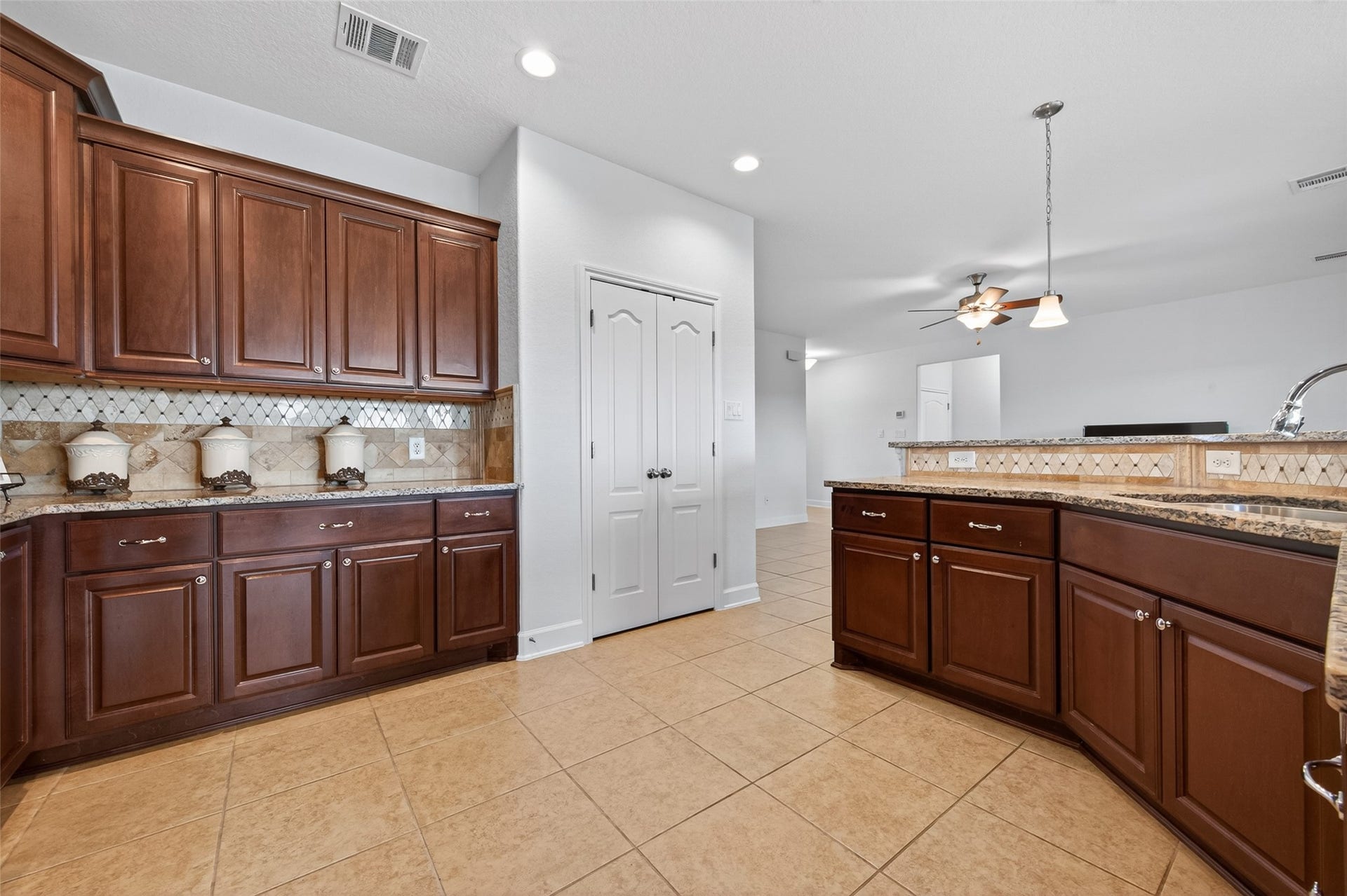 Spacious Open Concept Kitchen with Pantry