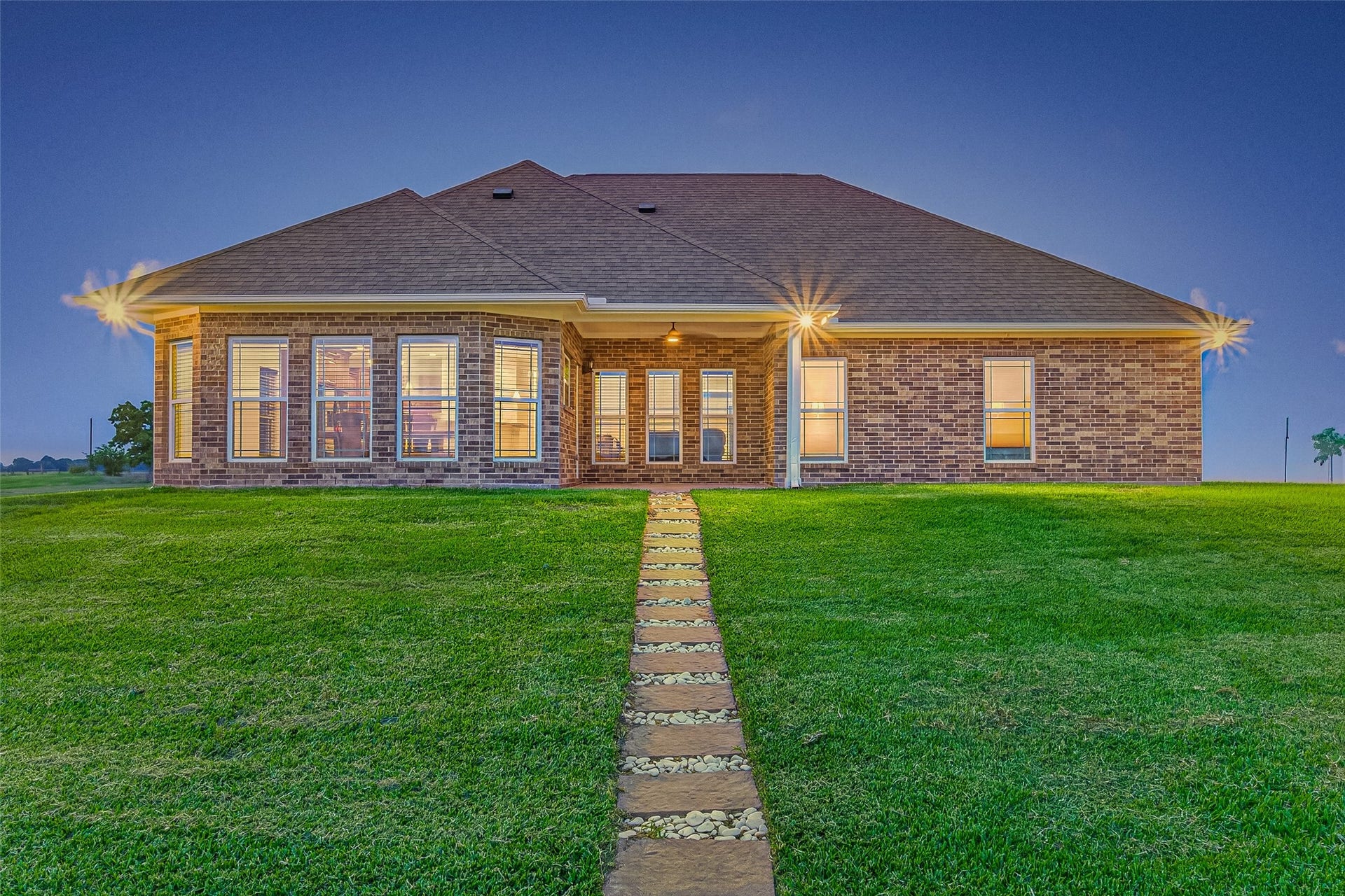 Back view of home - Picture cookouts, evenings around a fire pit, holiday gatherings, and watching the stars shine bright  - This is the kind of property where traditions are created and cherished for years to come