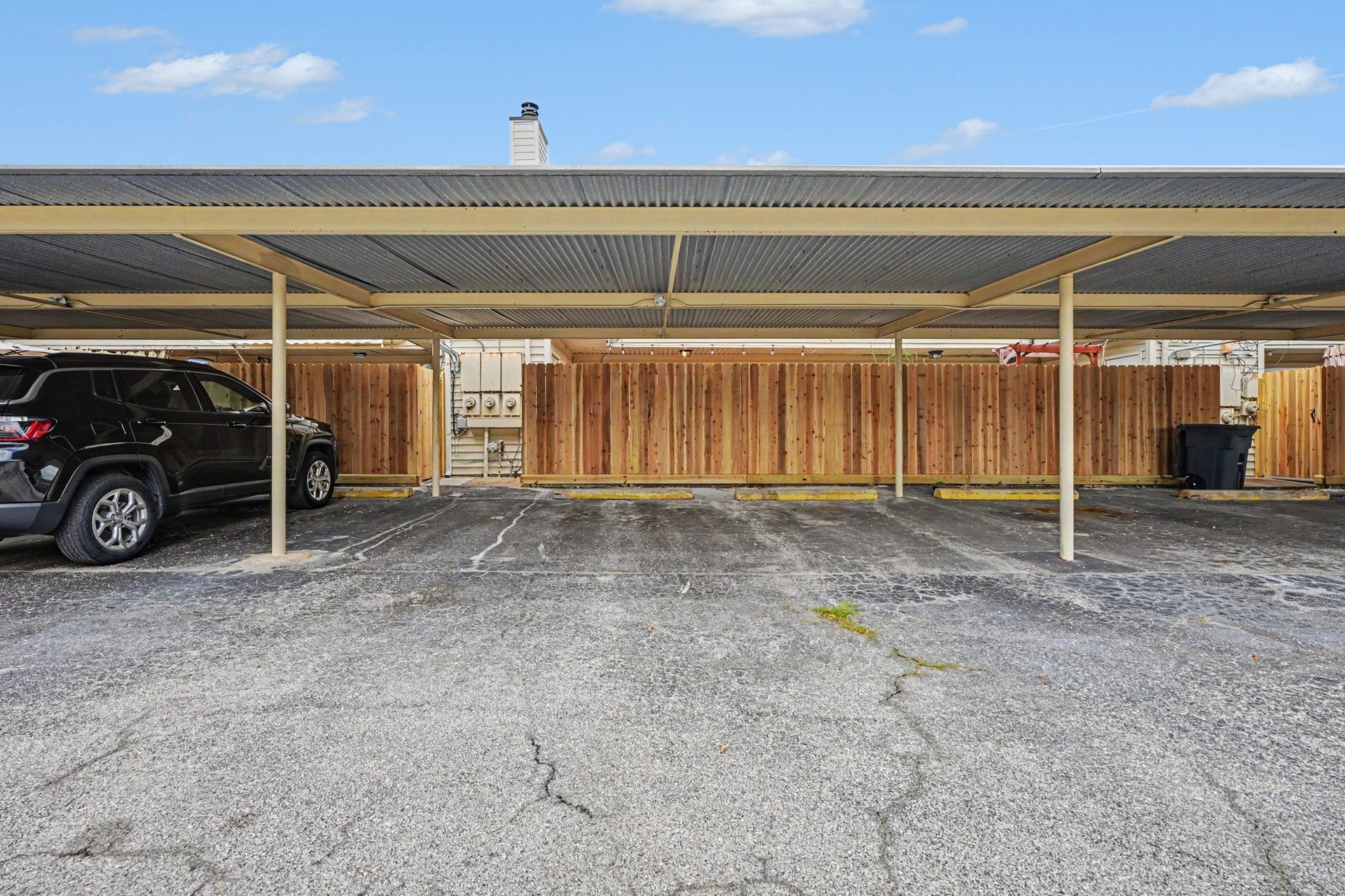 18206 Heritage Lane, #8206, Nassau Bay, TX 77058 2 Covered parking spots just outside the back gate.