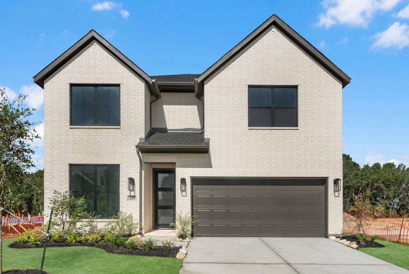 219 Yellow Rosewood Lane, New Caney, TX 77357 Move in Ready. Westin Homes *New Construction* Manhattan Plan. Grass is digitally enhanced.