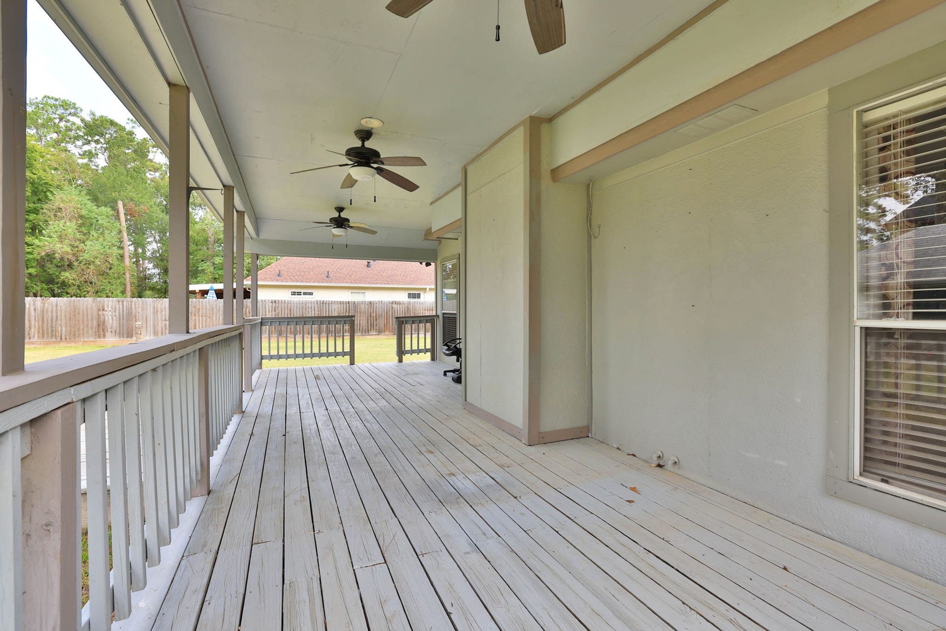10403 Twin Oak Drive, Conroe, TX 77385 Huge covered patio for grilling, chilling and entertaining friends and family!