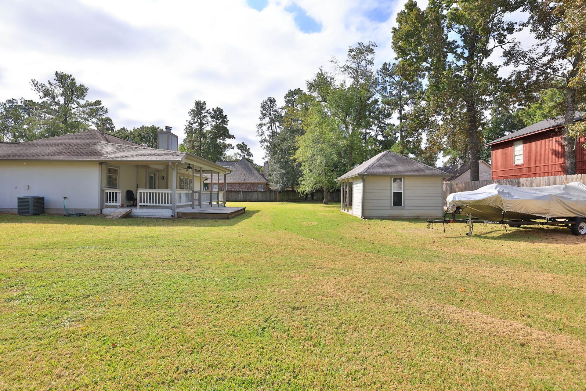10403 Twin Oak Drive, Conroe, TX 77385 Backyard is fenced with plenty of space for a boat and/or RV