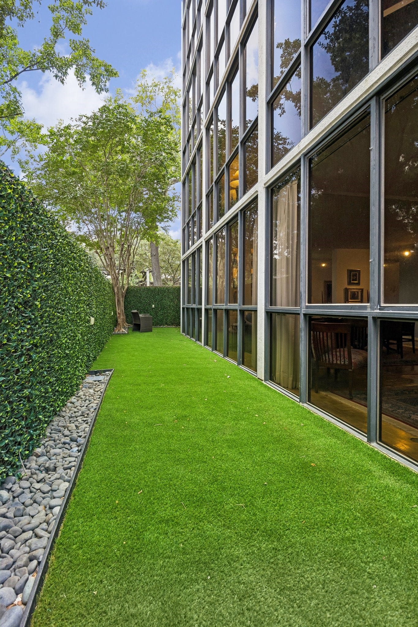 Un-modified view, without digital enhancement of the actual spacious private outdoor terrace. Highlighting the expansive size of the open area with ample room for entertaining family and friends.